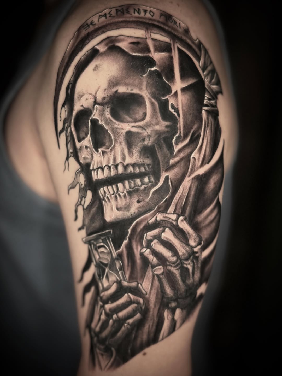 Grim reaper with hourglass realism tattoo on the shoulder by Terence Taylor