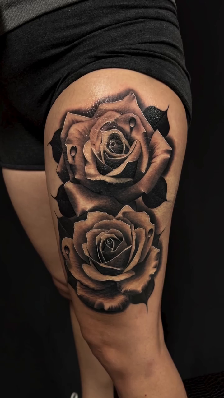 Two realistic roses dotwork tattoo on the thigh by Thomas Conard