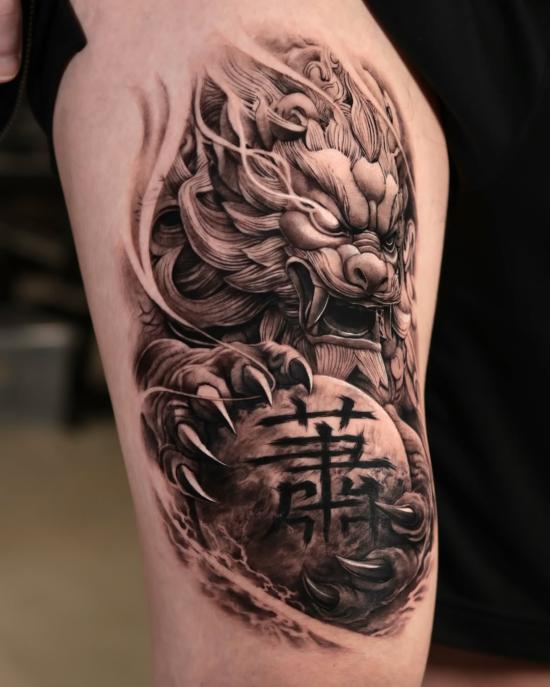 Dragon and chinese character Japanese tattoo on the thigh by Reset tattoo