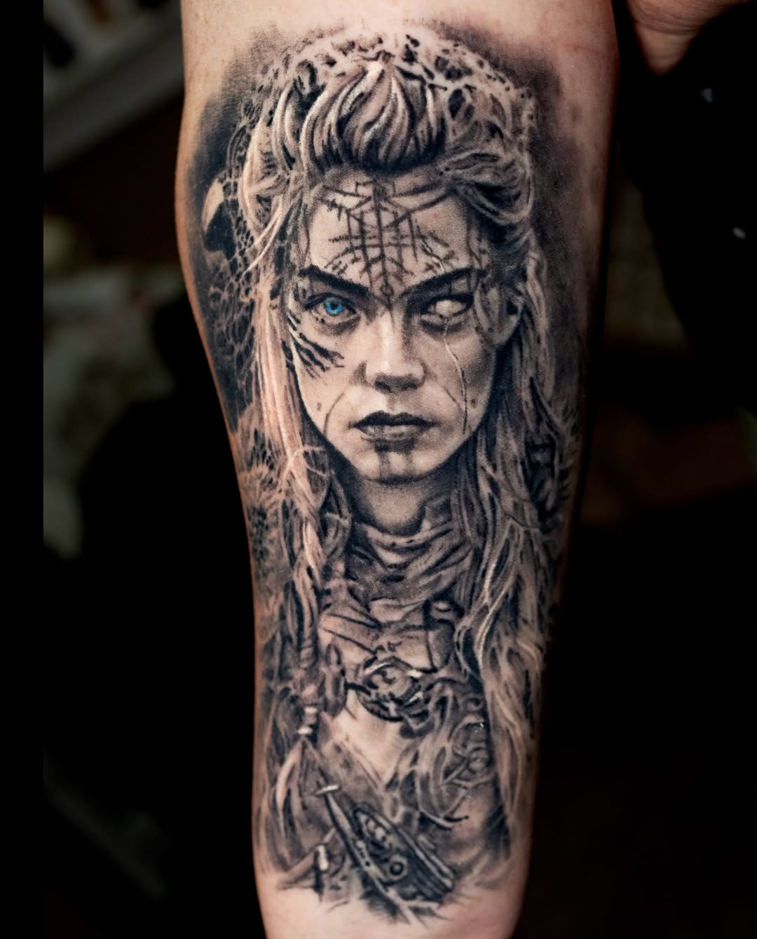 Woman with blue eye realism tattoo on the forearm by Realistic tattoos in Minneapolis, MN, Minneapolis, Minnesota