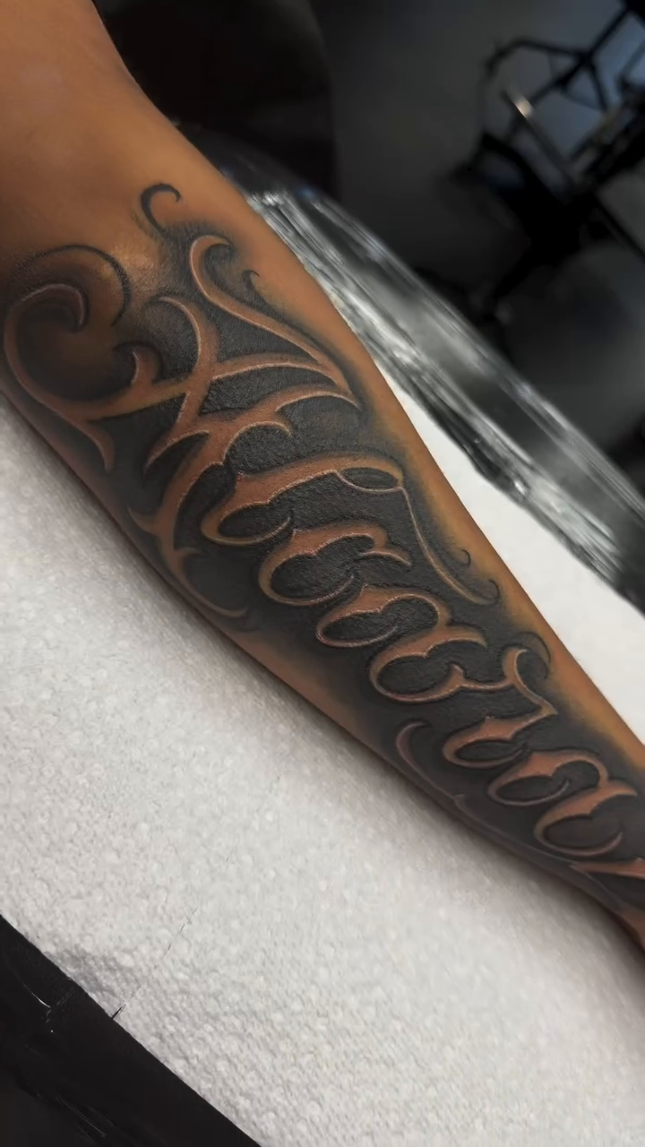 Tattoo by @bonnie_tatt2oos — lettering_script, black_and_grey