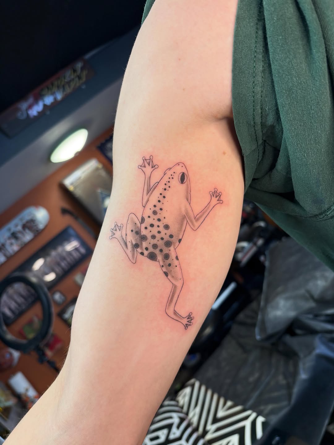 Frog dotwork tattoo on the forearm by alana khounmeuang