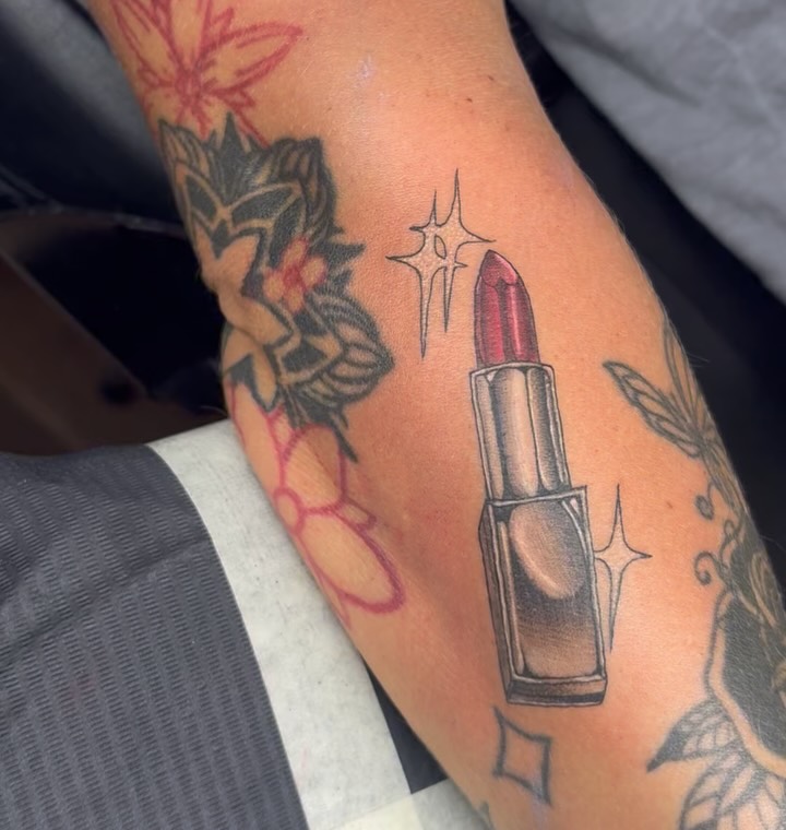Lipstick realism tattoo on the forearm by 𝔾𝔥𝓸ş𝔱