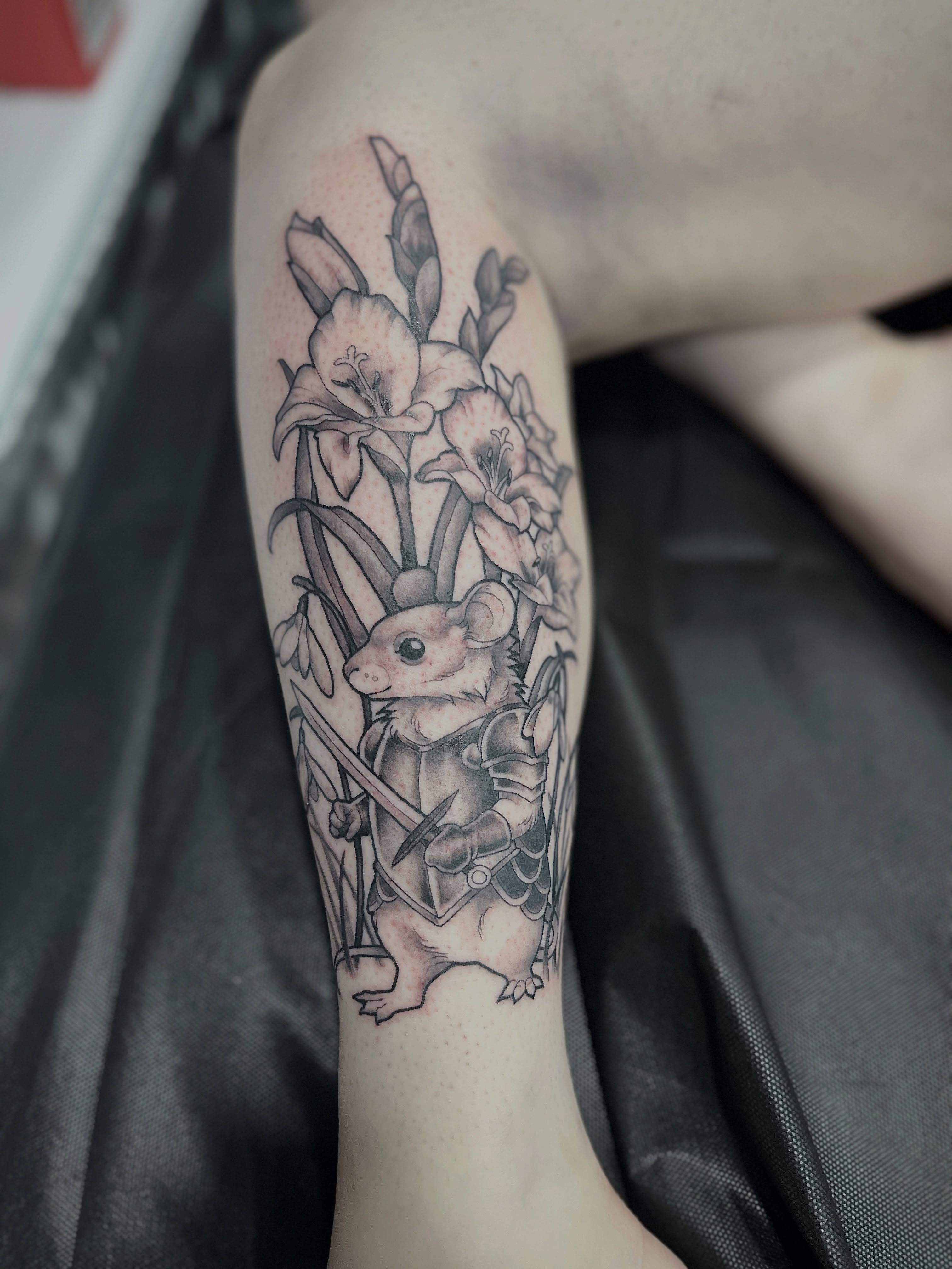 Possum warrior with flowers realism tattoo on the forearm by BELLIE ✧ Tattoo Artist