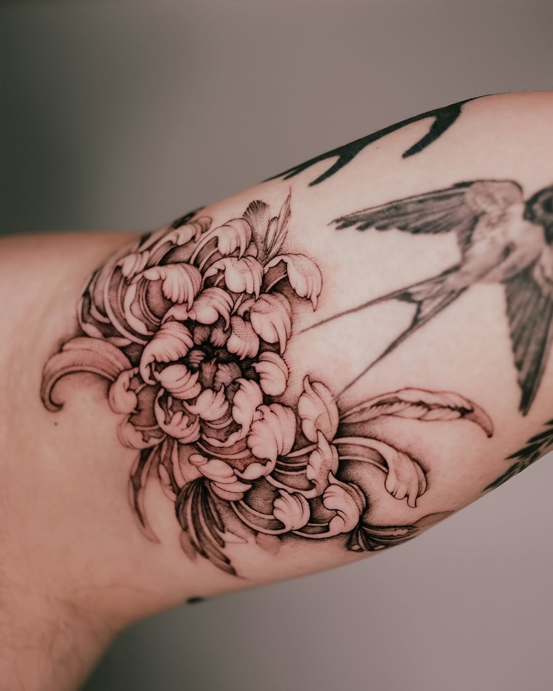 Chrysanthemum and swallow fine line tattoo on the forearm by Esther ✣ Fine Line Floral Tattoo Artist LA, Los Angeles, California