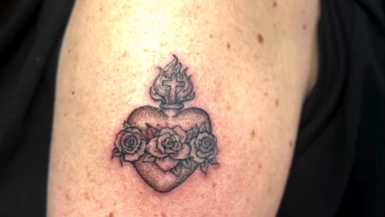 Sacred Heart with roses ornamental tattoo on the forearm by Van Cleave Aesthetics, Franklin, Tennessee