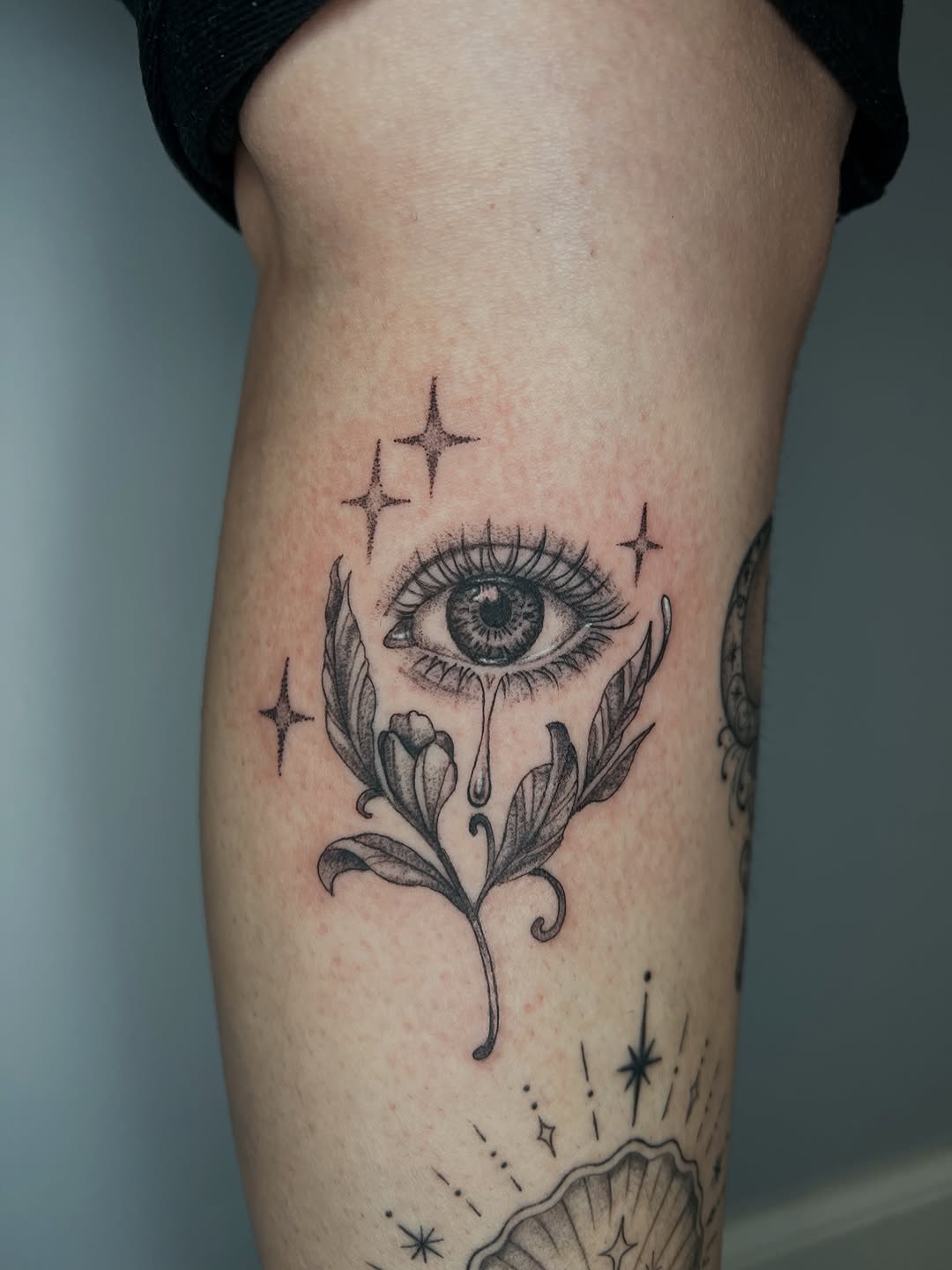 Eye with flower and stars ornamental tattoo on the forearm by ๐ฆ๐๐๐ก ๐ฆ๐๐๐