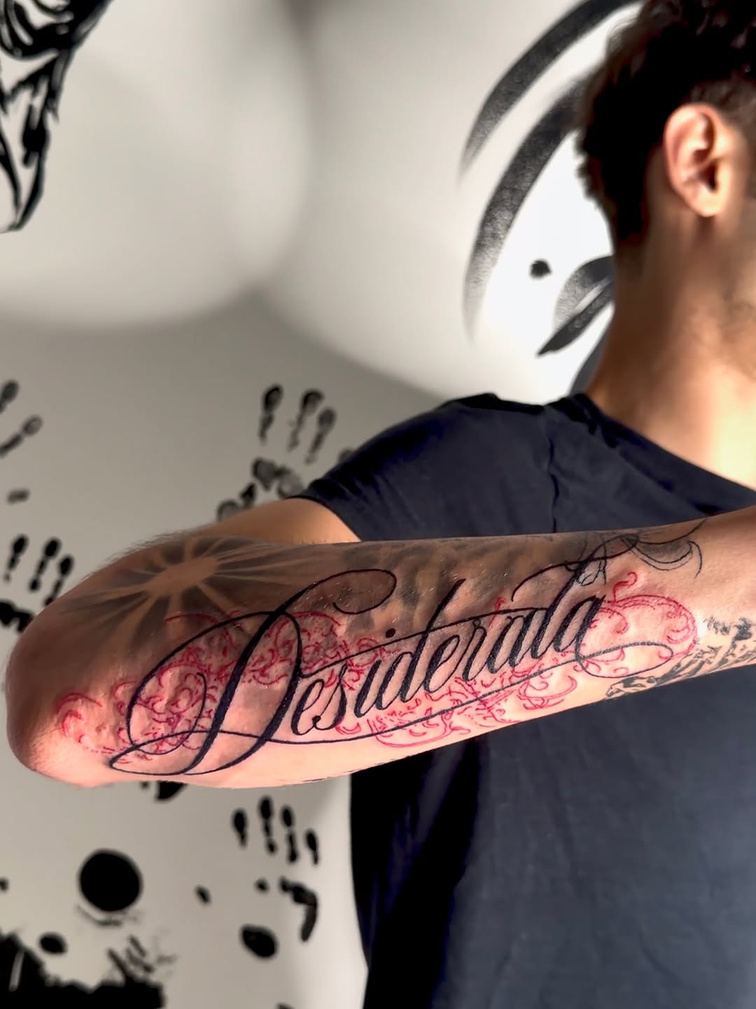 Desiderata script lettering with ornamental fill lettering tattoo on the forearm by K Valentine