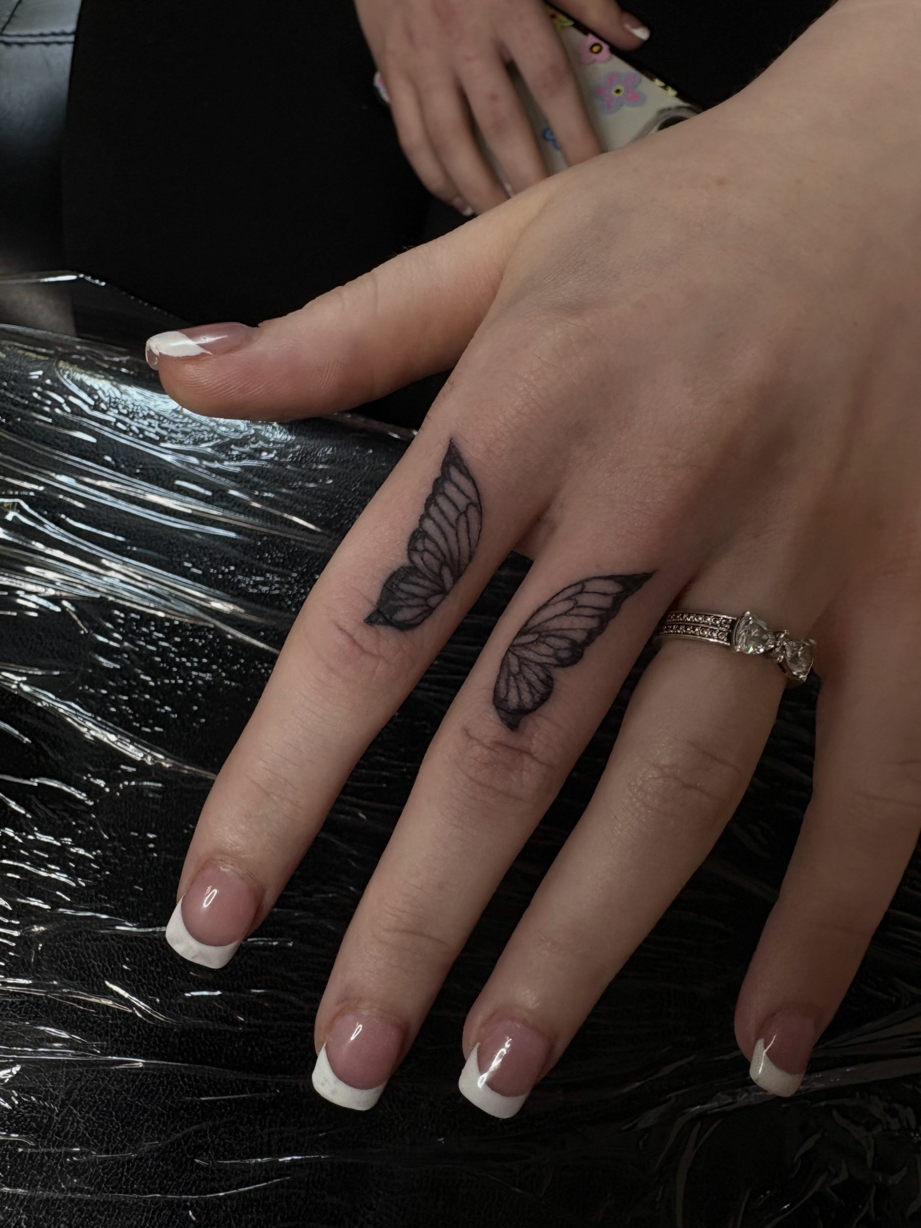 Wings black and grey tattoo on the hand by Cincinnati Tattoo Artist