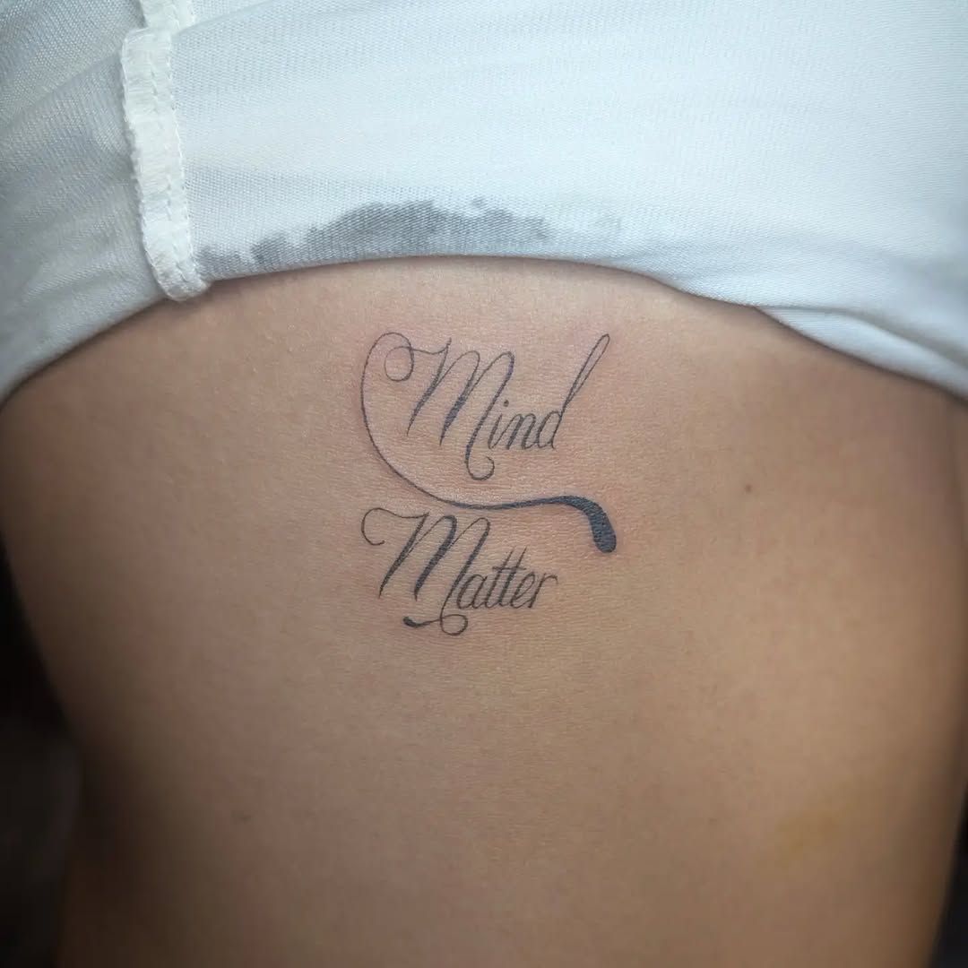 Mind Matter text lettering tattoo on the thigh by Jo Xylo - Minneapolis Tattoo Artist, Minneapolis, Minnesota
