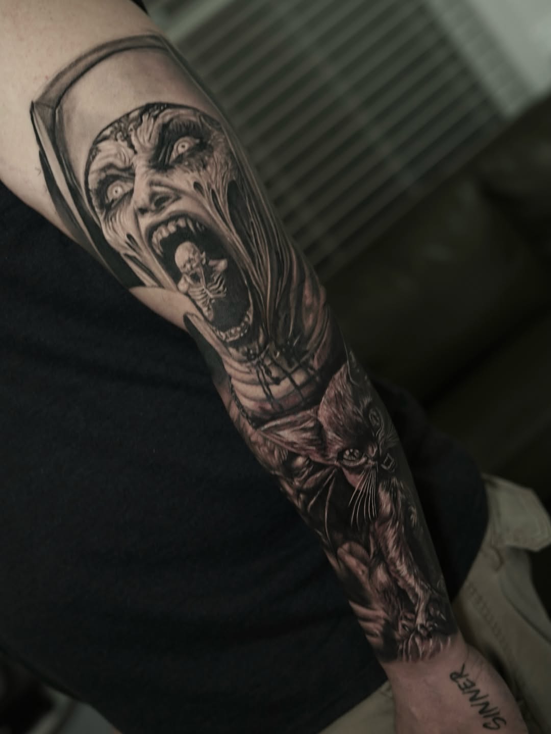 Demonic nun and cat realism tattoo on the forearm by Nelson Tellez