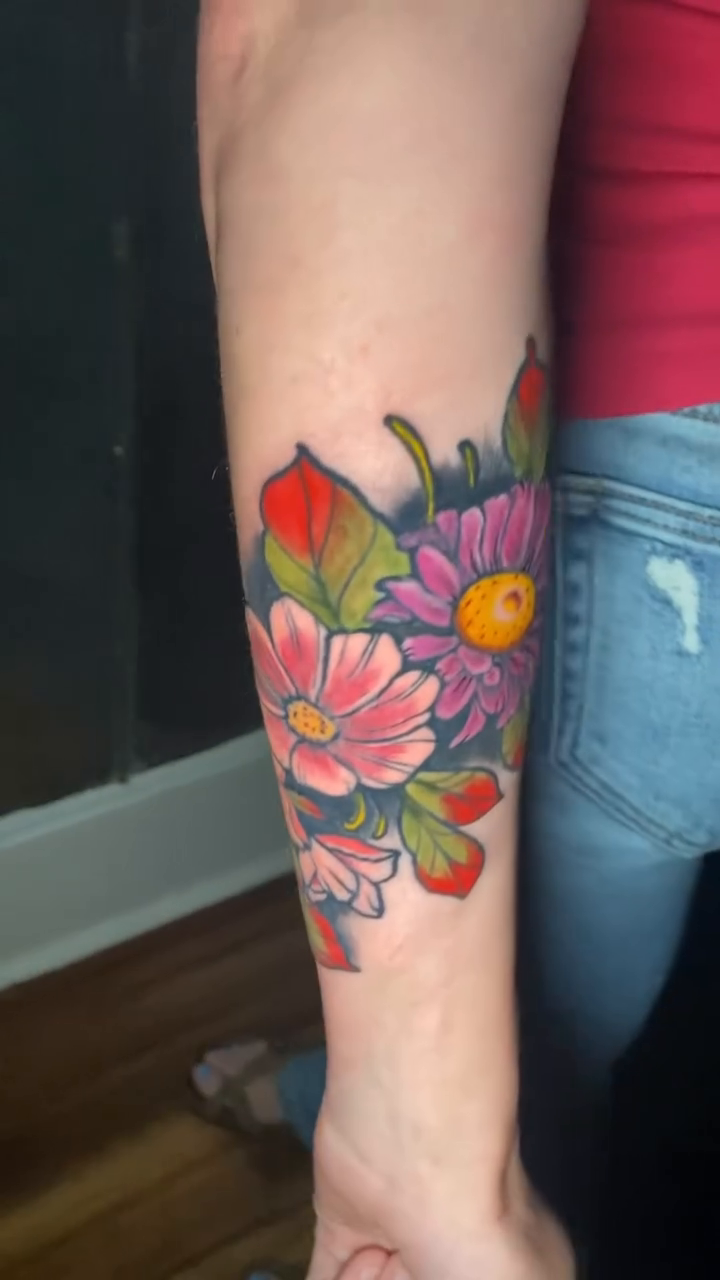 Floral tattoo on forearm neo-traditional tattoo on the forearm by Ian Dorman