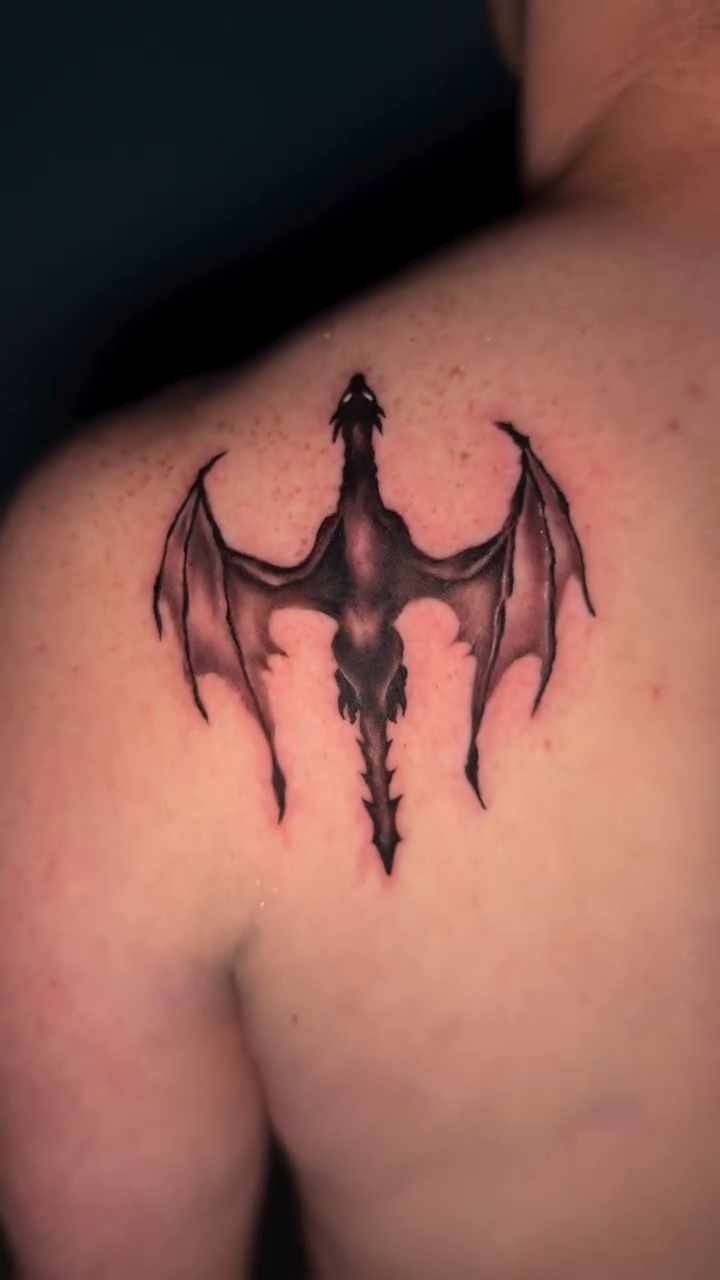 Dragon tattoo on back blackwork tattoo on the back by Erin Peterson