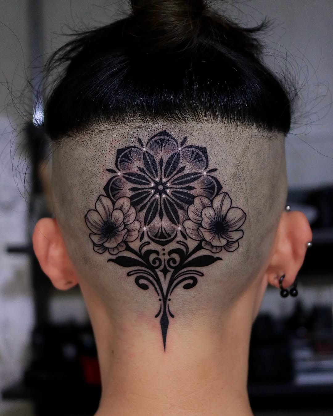 Mandala with flowers geometric tattoo on the head by Seoul tattoo
