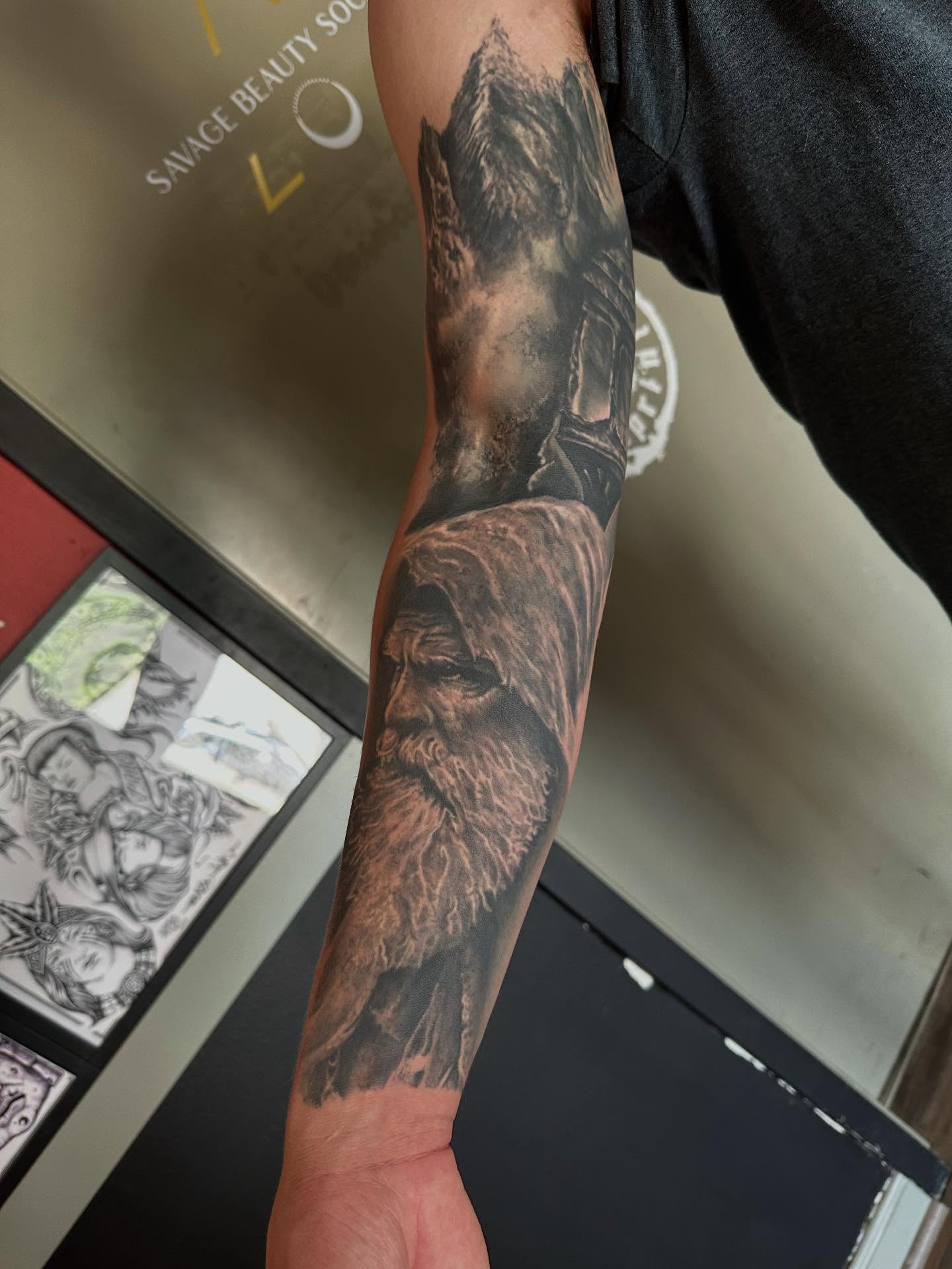 Bearded man realism tattoo on the forearm by Neil5one3