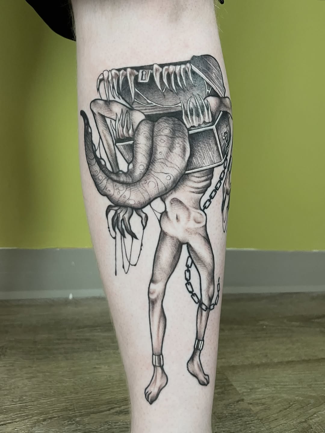 Tattoo by @erinhainestattoos — dark_realism, black_and_grey
