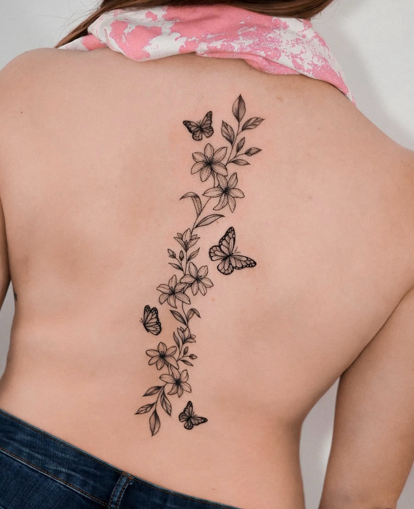 Flowers and butterflies black and grey tattoo on the back by Chelsea 🍀 Fine Line Tattoo Artist 🖊️🖊️🖊️, Houston, Texas