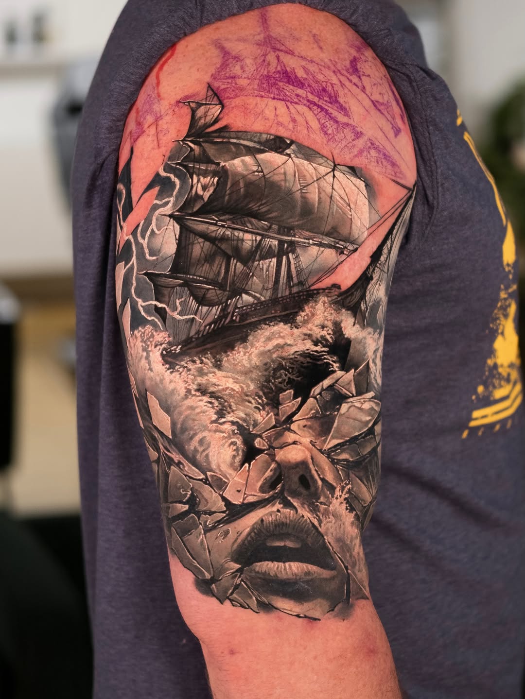 Surrealism tattoo on the forearm by Christopher Powell