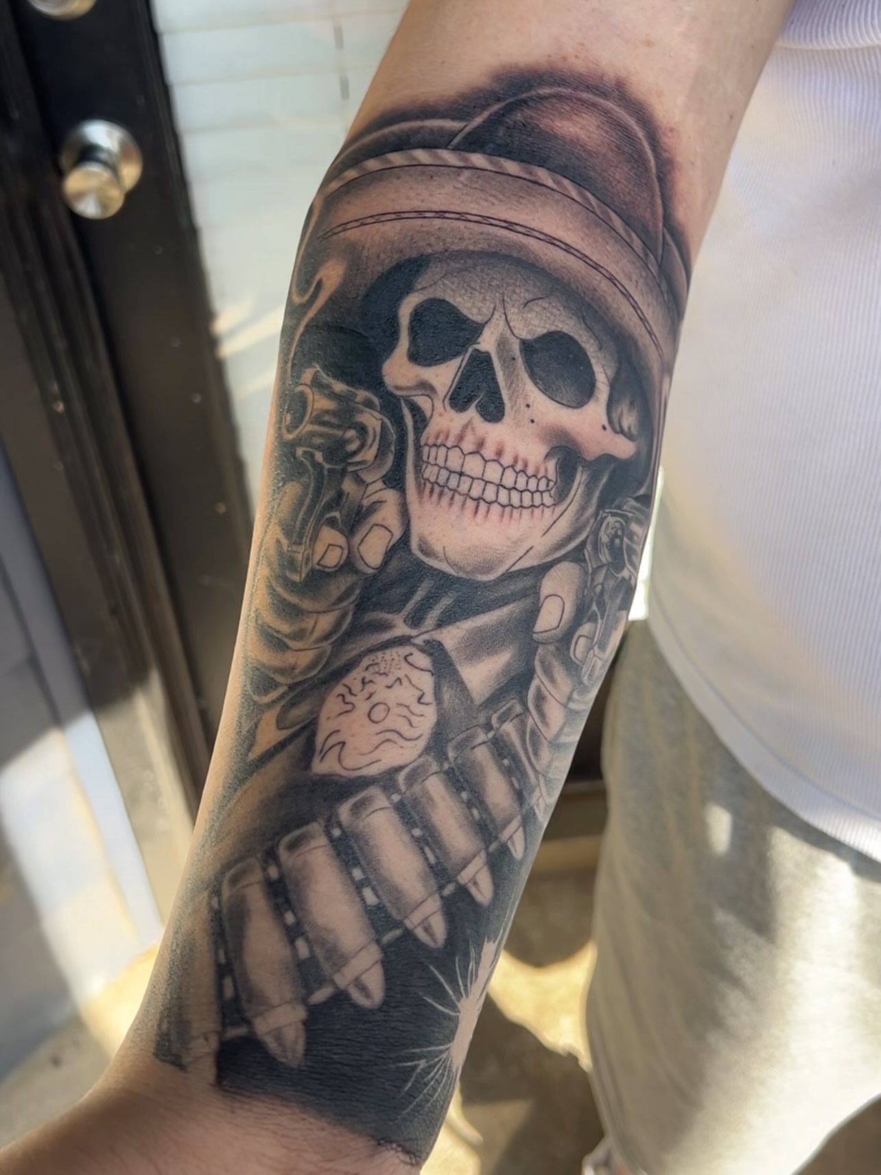 Skull with mechanical elements realism tattoo on the forearm by Dallas tx tattoo artist ✝️