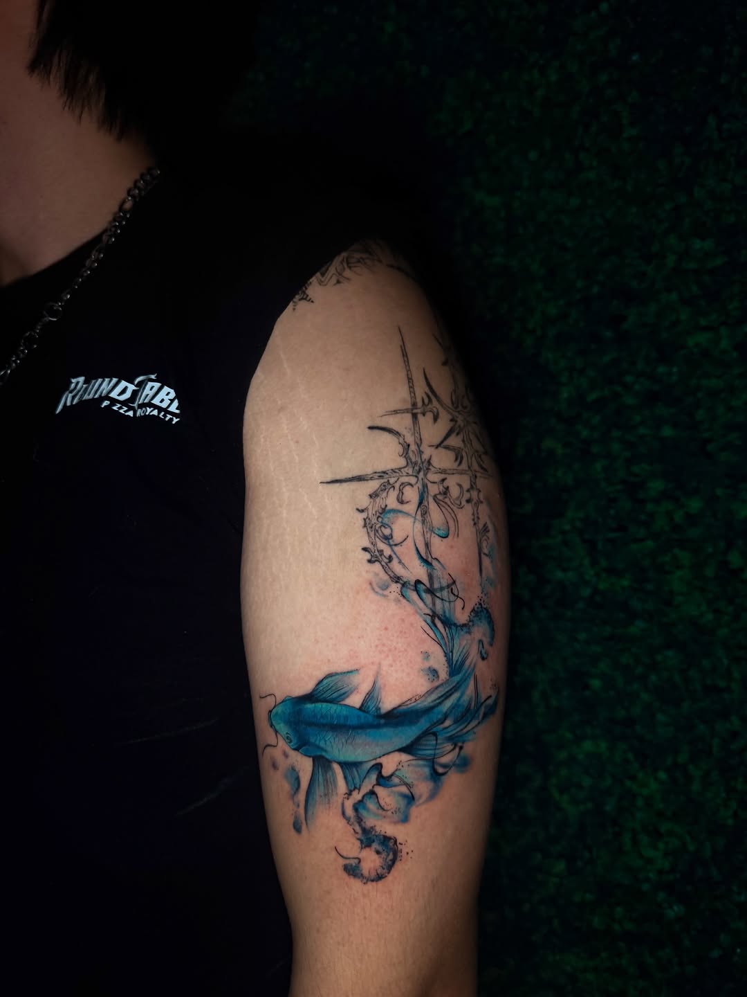Blue koi fish with abstract elements watercolor tattoo on the upper arm by bella :)