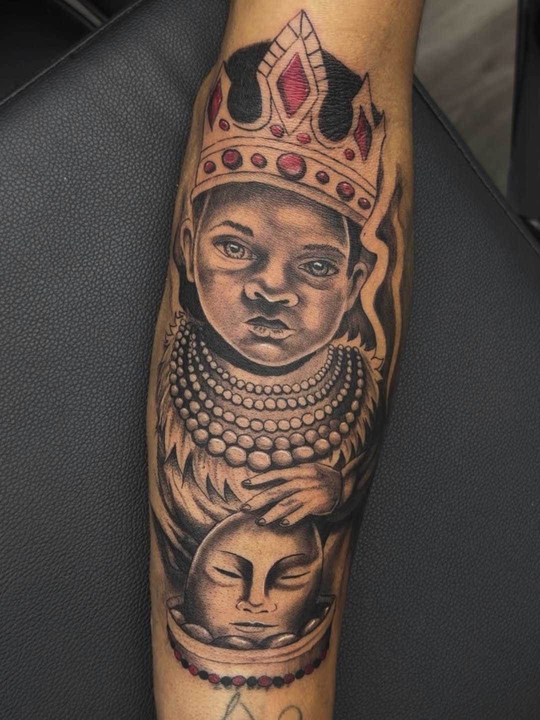 Child with crown and mask realism tattoo on the forearm by 🐺