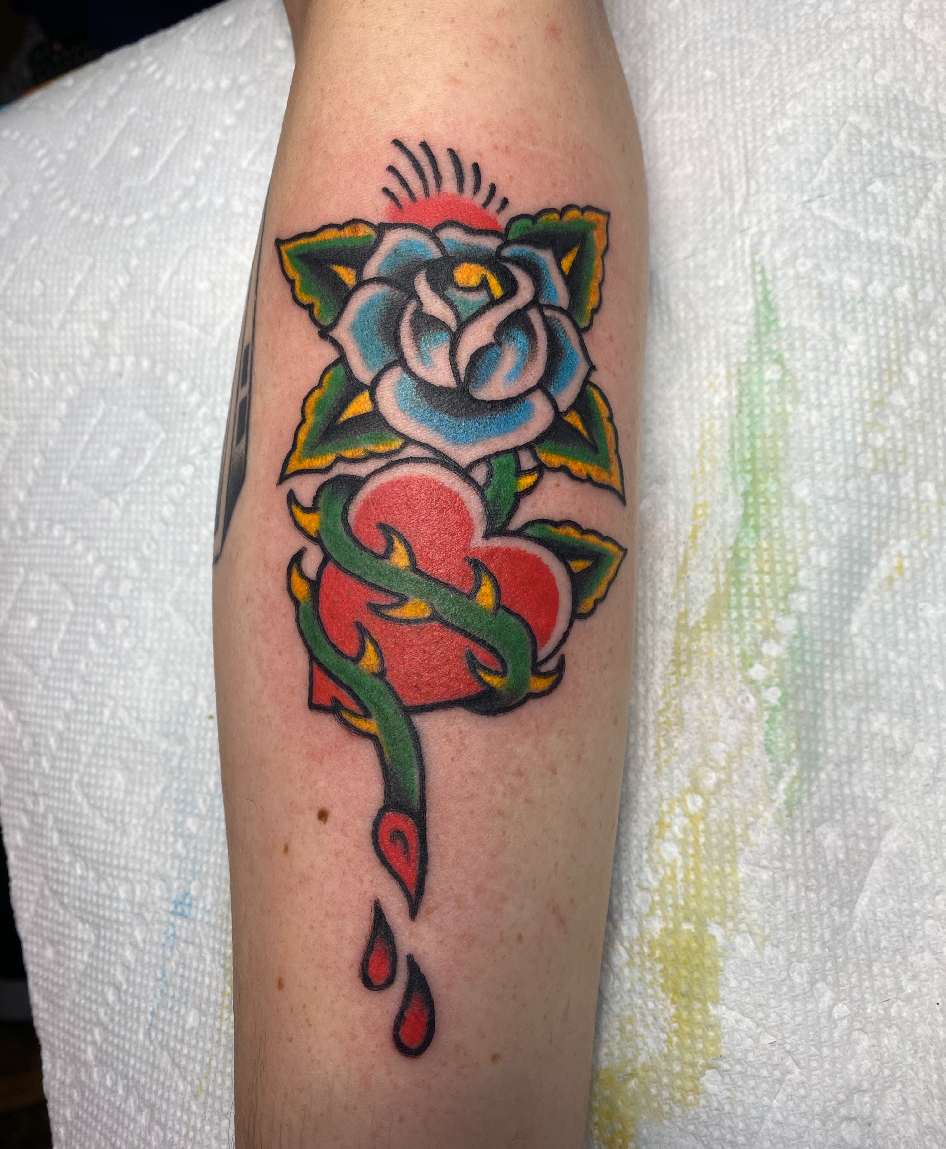 Rose and heart American traditional tattoo on the forearm by Karl Hegwein, Portland, Oregon