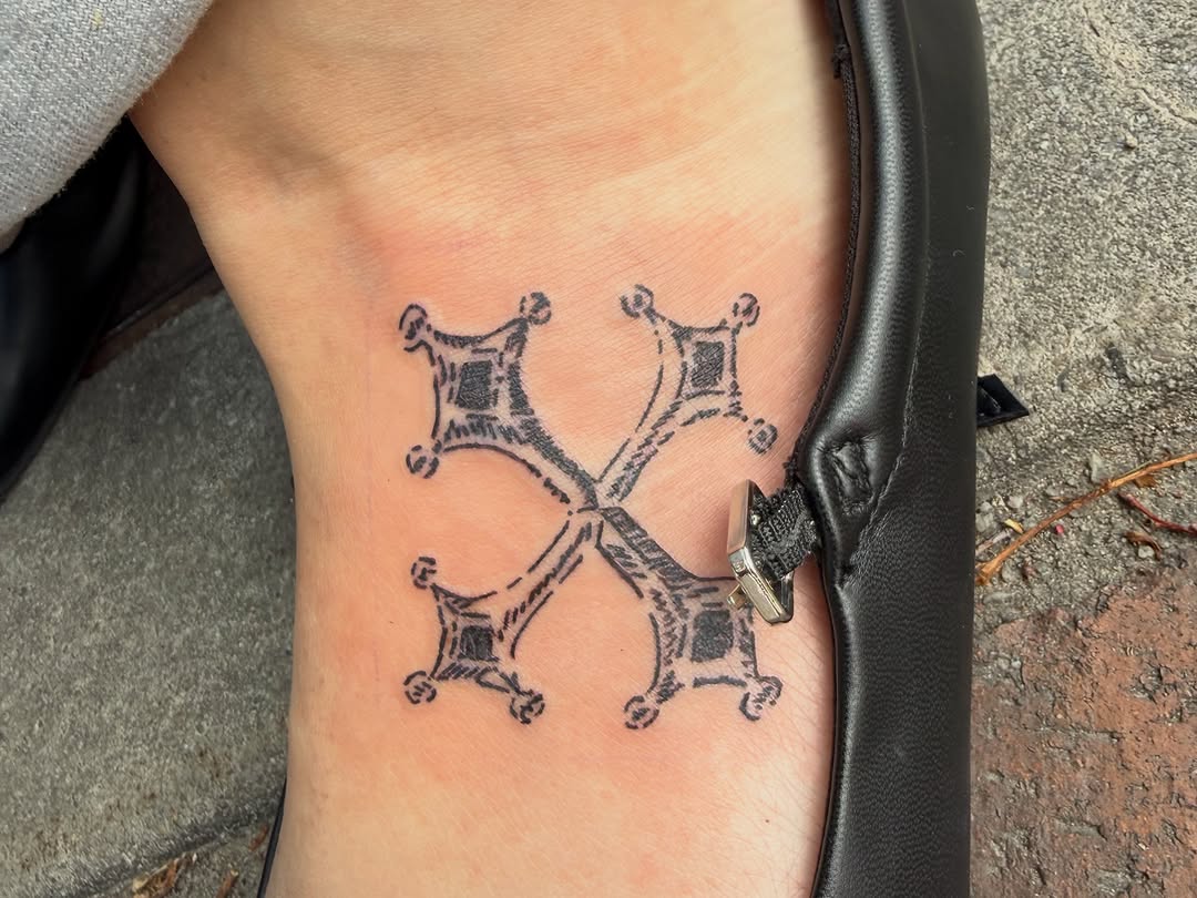 Tattoo by @divinearcaneart — blackwork