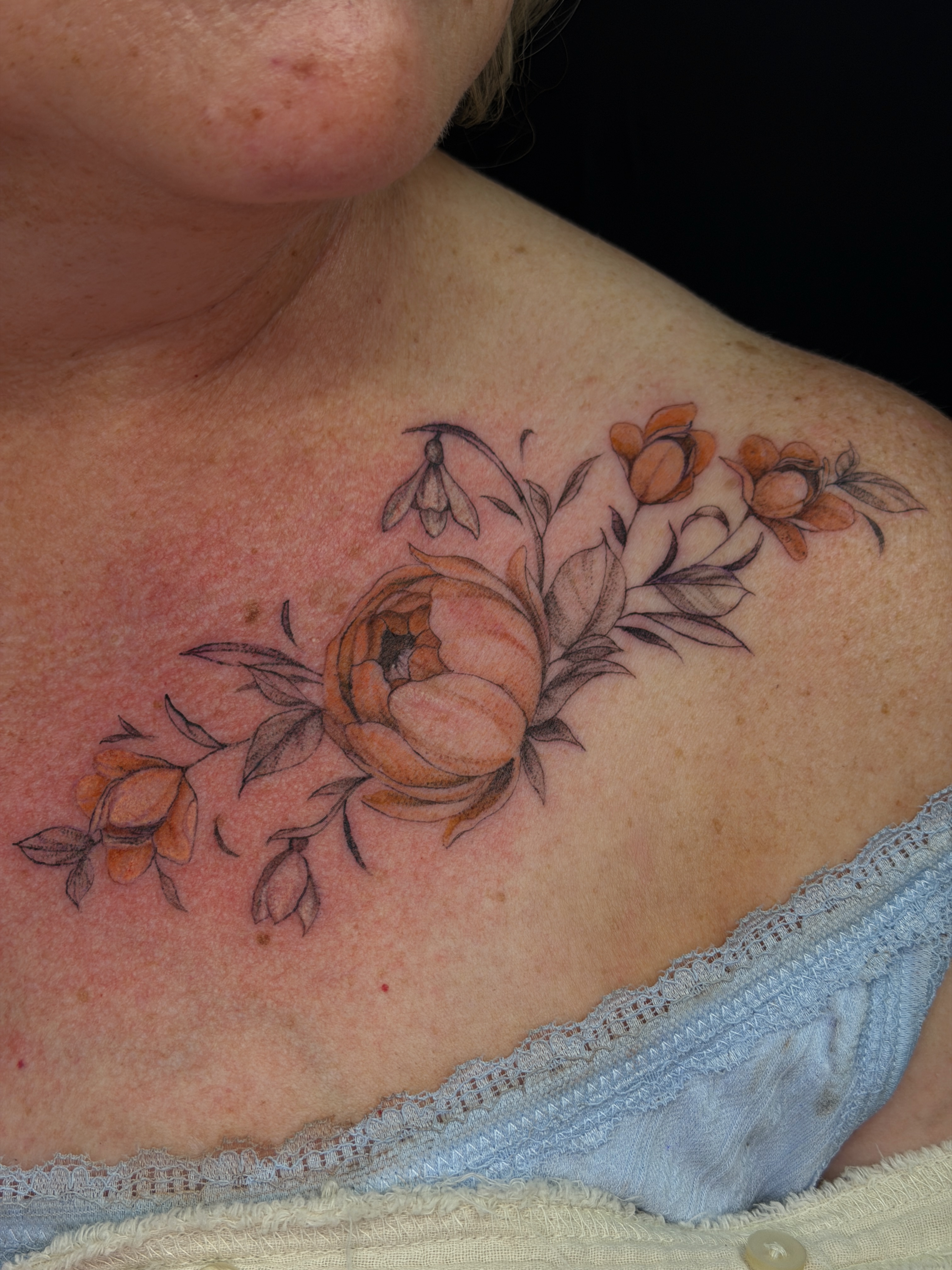 Peony black and grey tattoo on the shoulder by Hues 🦤 Clarksville Fine Line and Blackwork