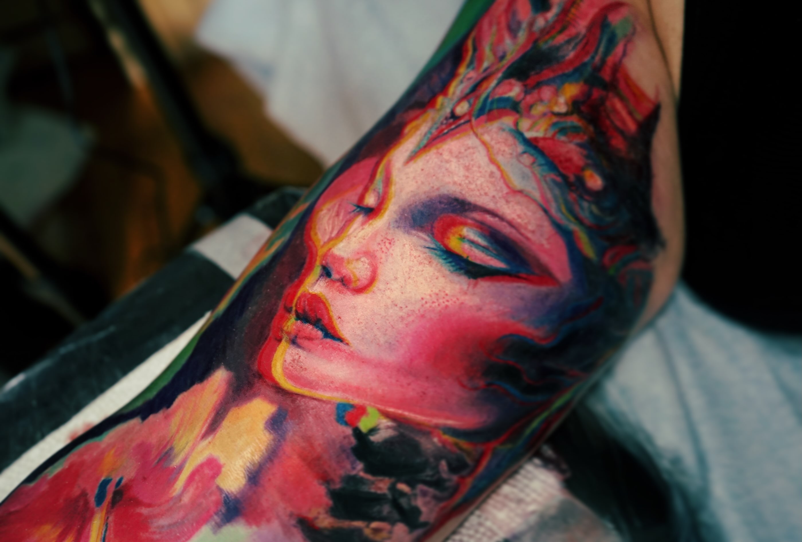 Abstract woman watercolor tattoo on the forearm by Nyahzul - Glitch Tattoo Artist NYC