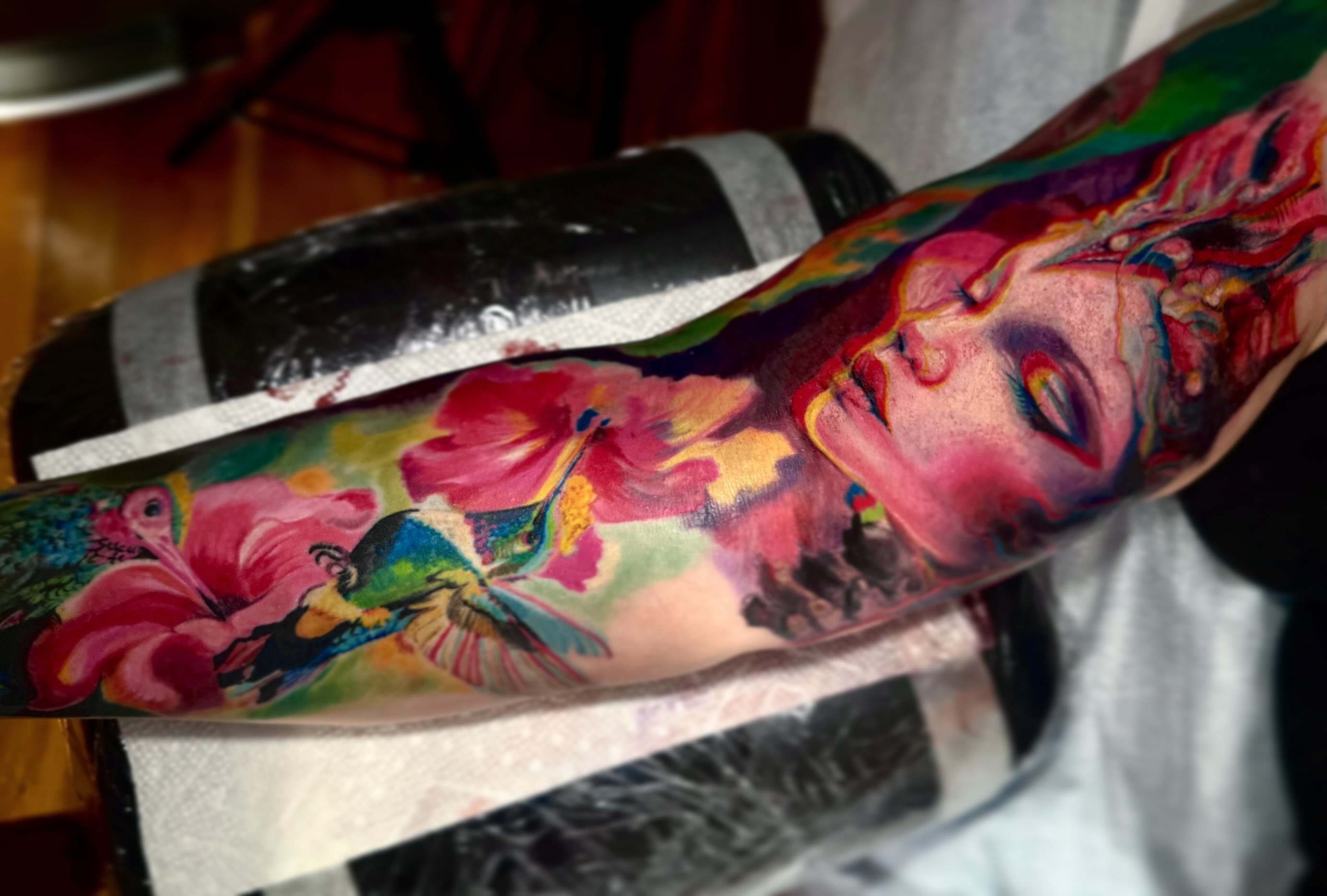 Woman with flowers new school tattoo on the forearm by Nyahzul - Glitch Tattoo Artist NYC