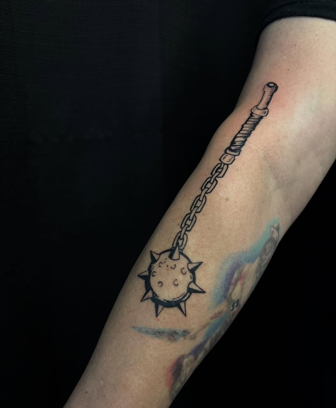 Flail mace minimalist tattoo on the forearm by Pres!