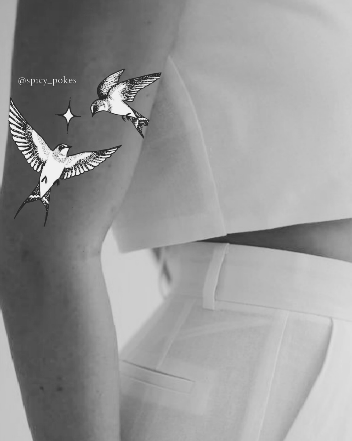 Swallows black and grey tattoo on the upper arm by Grace Wise - Handpoke Tattoos