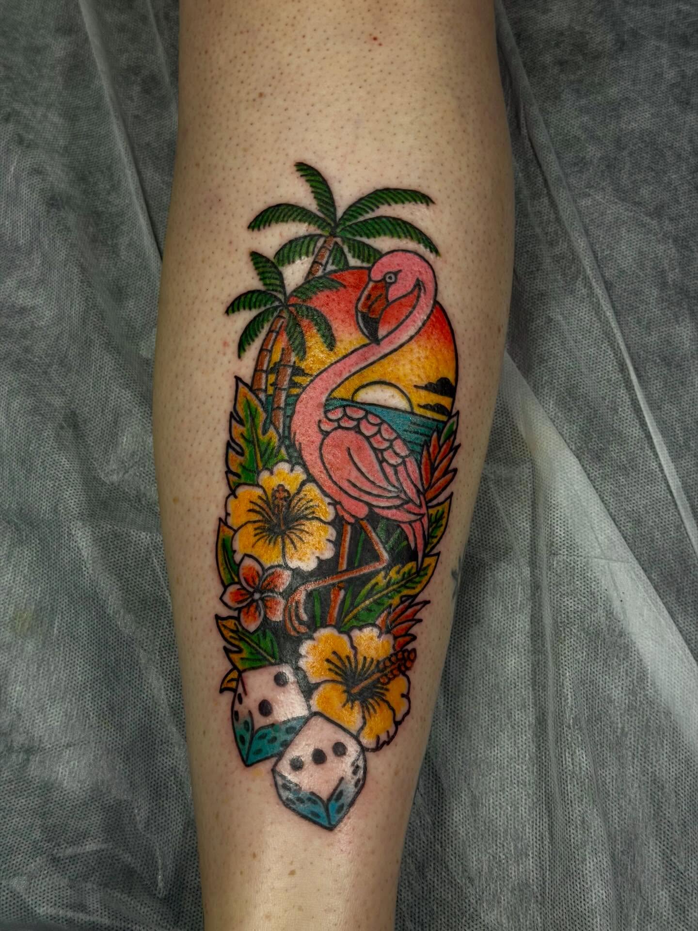 Flamingo and tropical flowers new school tattoo on the forearm by C.J.K. Roy