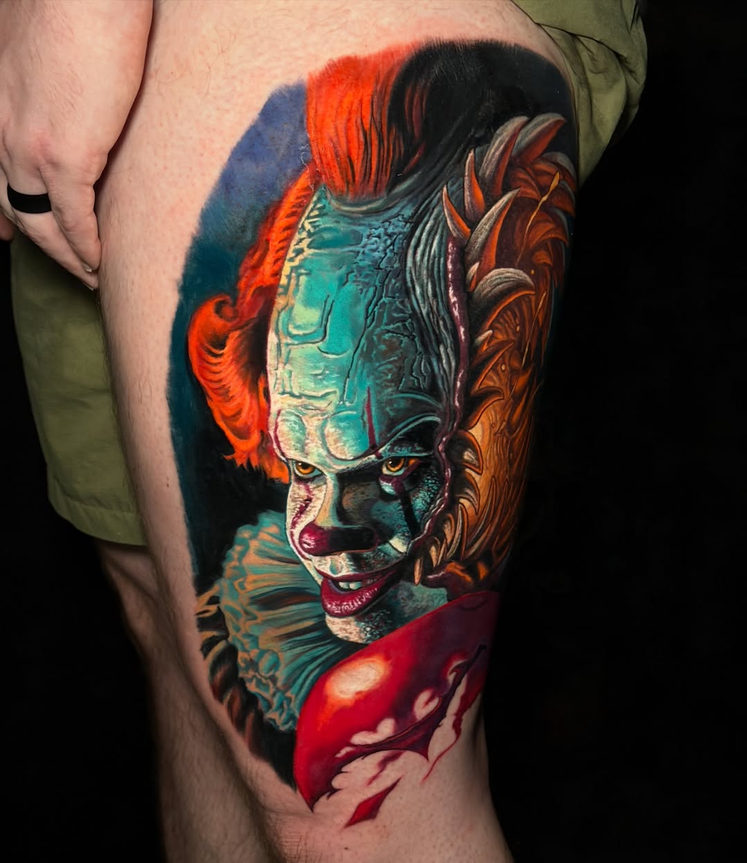 Pennywise the clown realism tattoo on the thigh by Sean Foy