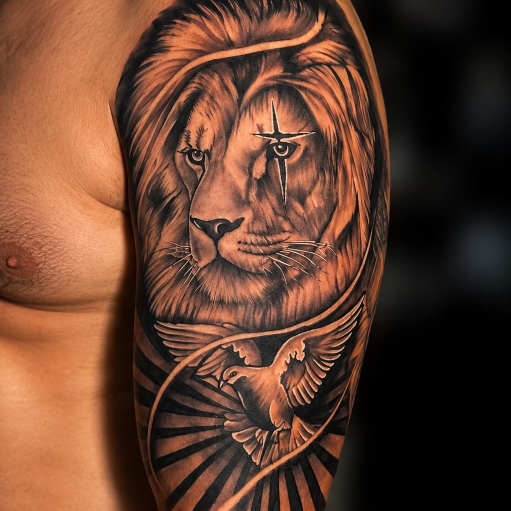Lion and dove realism tattoo on the upper arm by PMU Artist