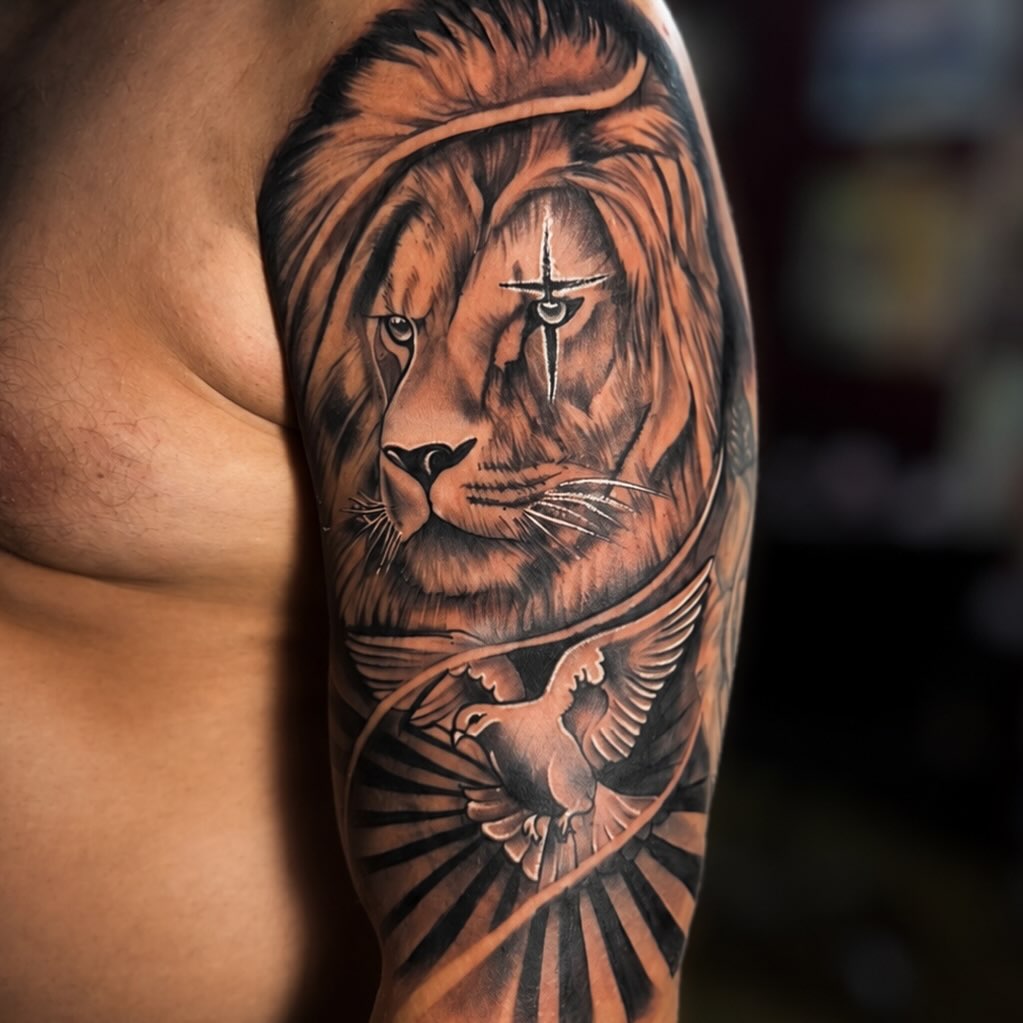 Lion and dove realism tattoo on the forearm by PMU Artist