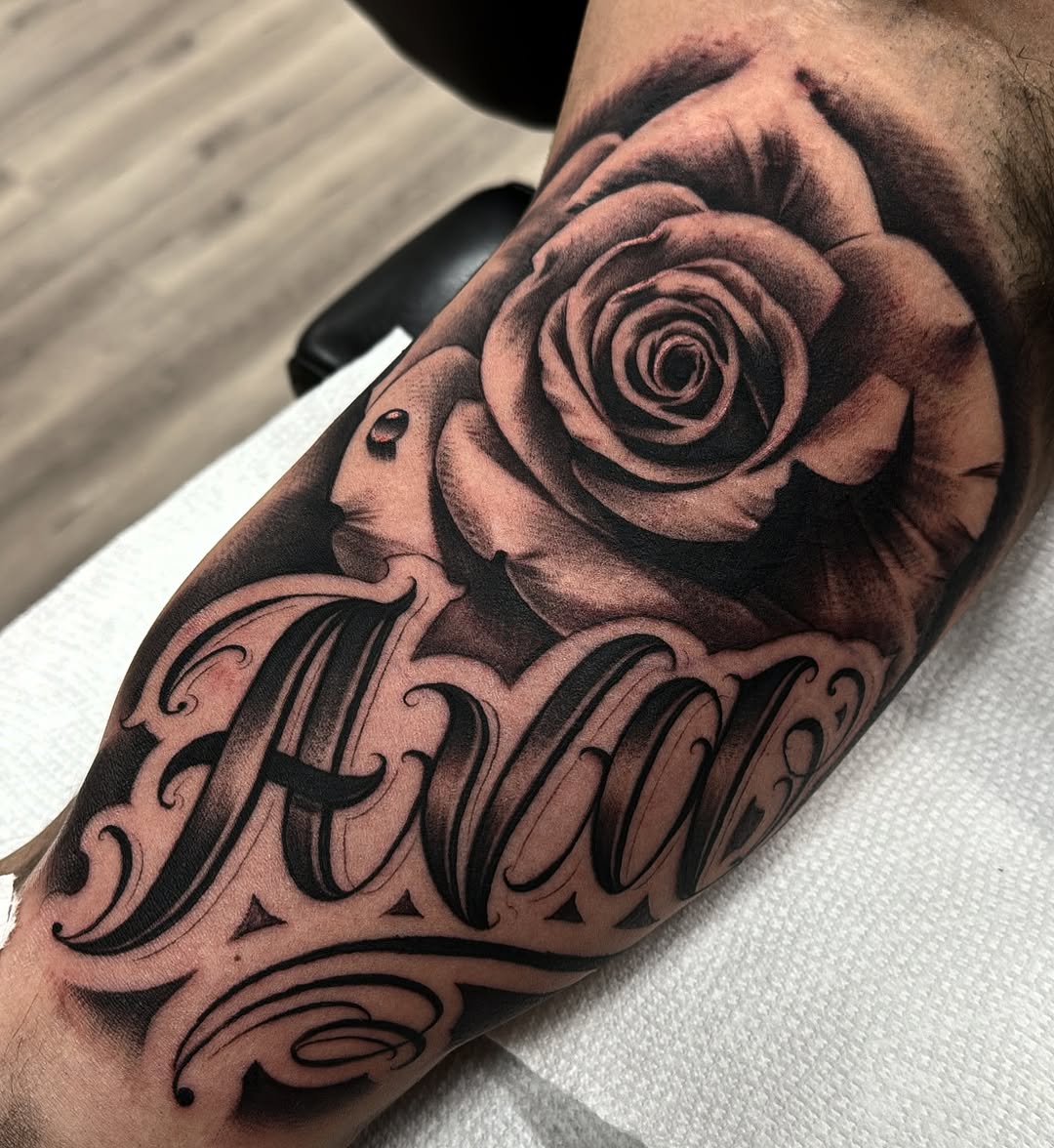 Tattoo by @eksoe_ — black_and_grey, lettering_script