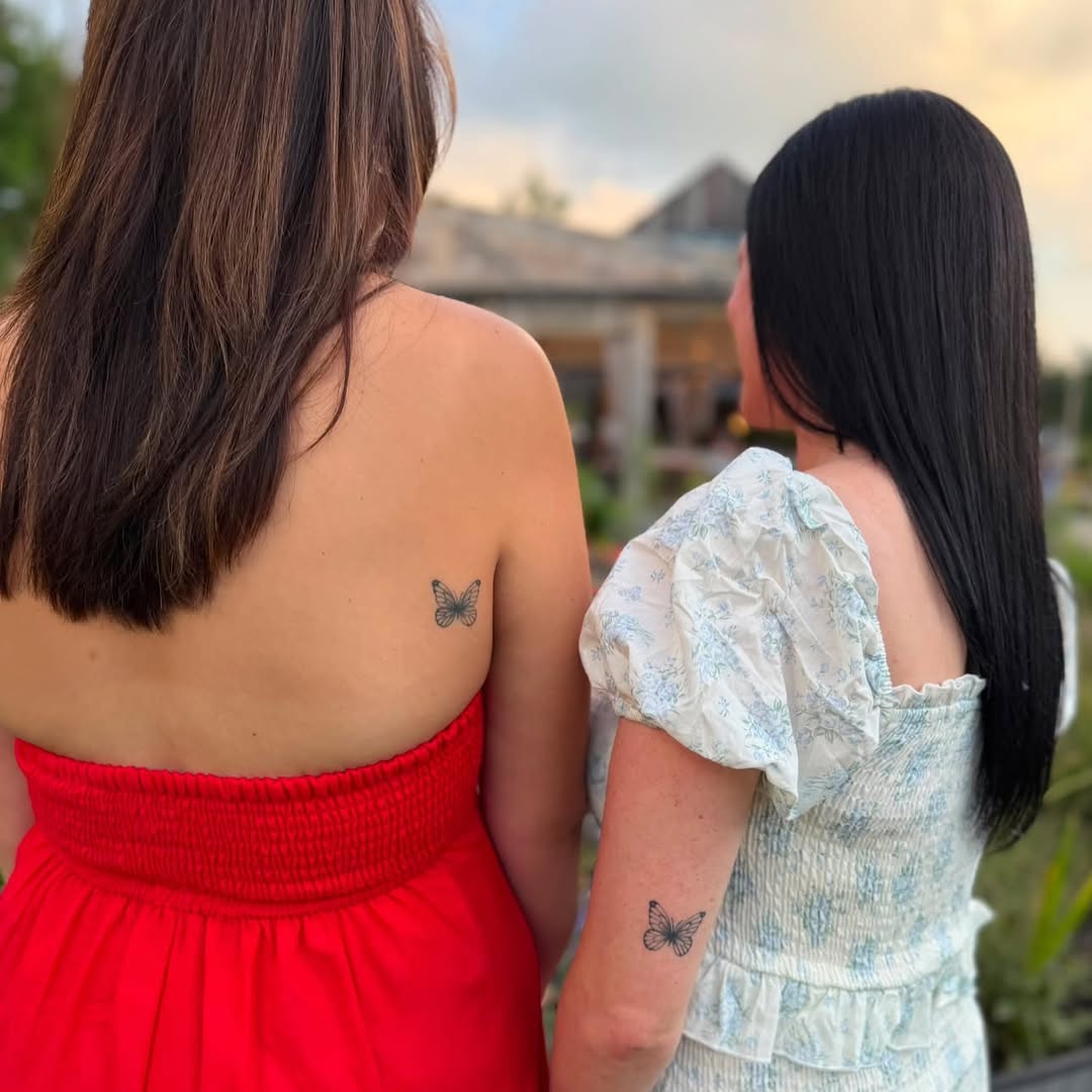 Butterflies fine line tattoo on the back by 𝕽𝖆𝖈𝖍𝖊𝖑 𝕽𝖆𝖉𝖎𝖈𝖆𝖑 Queens Tattooer