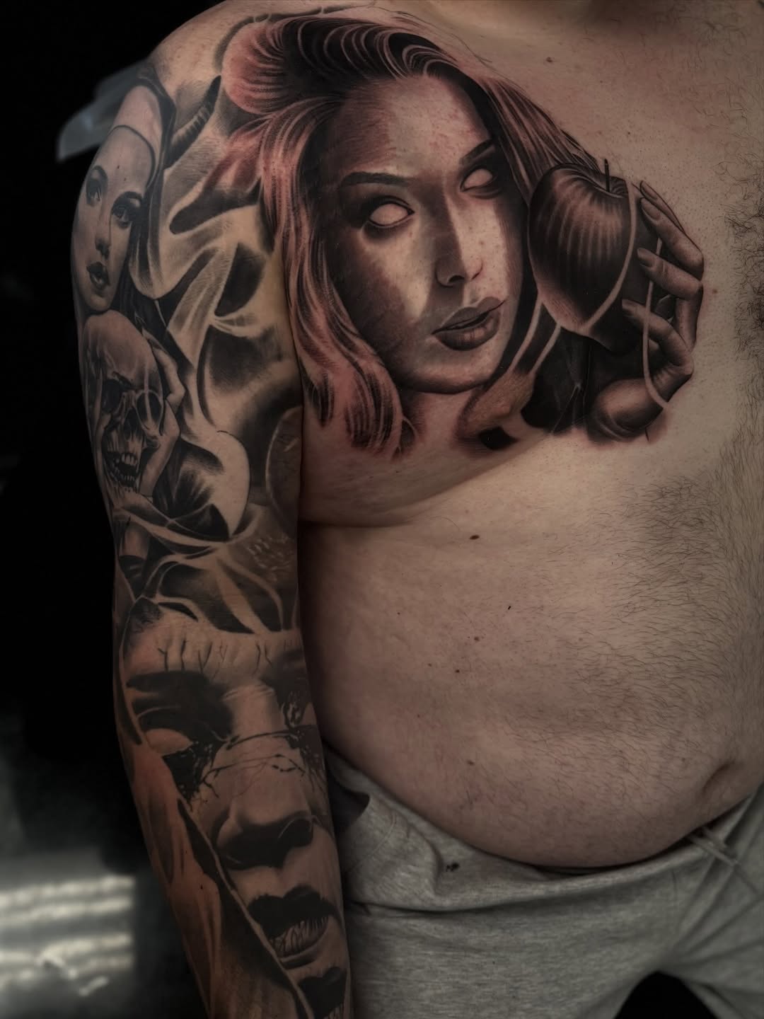 Tattoo by @angel_damiangg — realism, black_and_grey