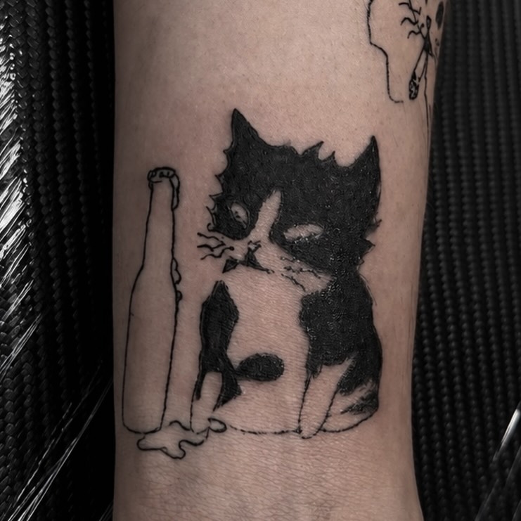 Cat black and grey tattoo on the forearm by rylie :P