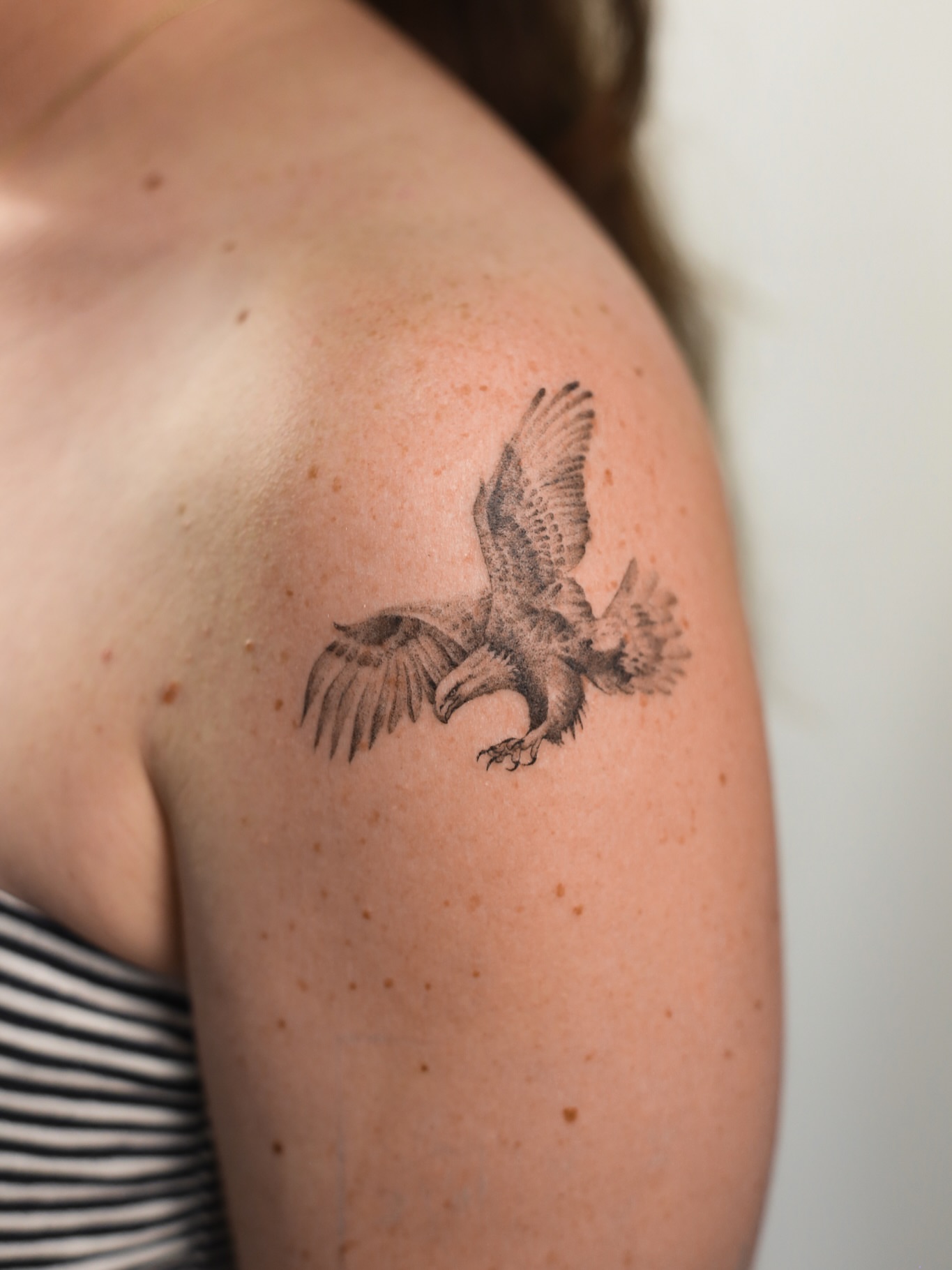 Eagle black and grey tattoo on the shoulder by Inna Petrova, Kitchener, Ontario
