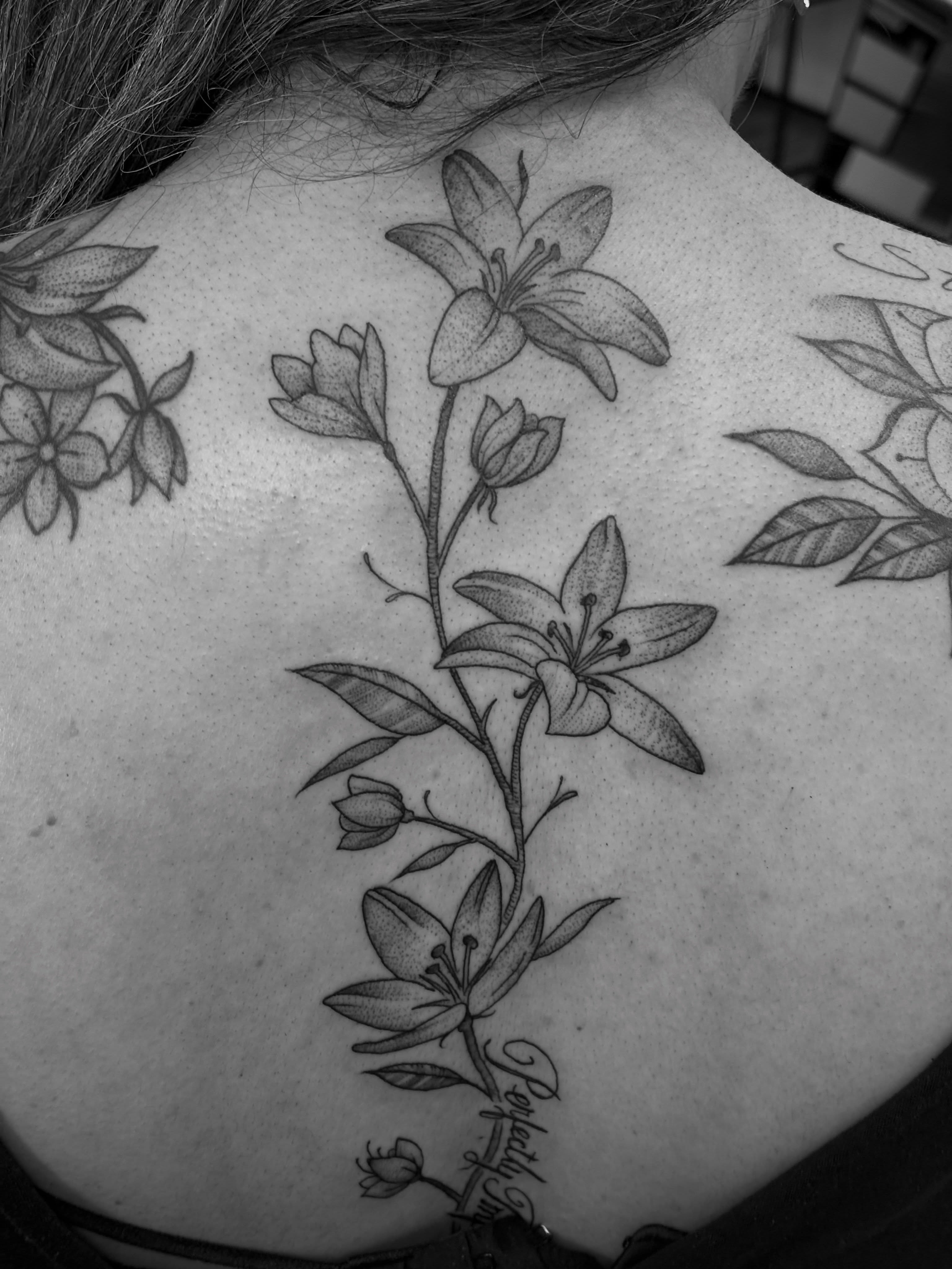 Lily flowers dotwork tattoo on the back by Jason Allen, Avondale, Arizona