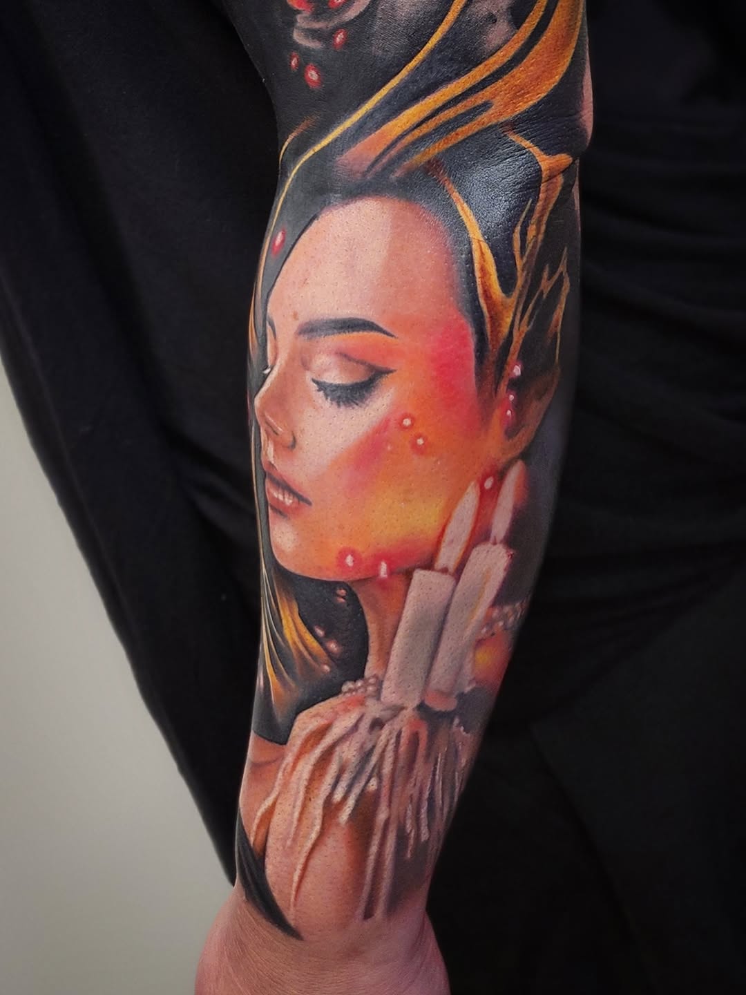 Woman with candles neo-traditional tattoo on the forearm by Su Kang