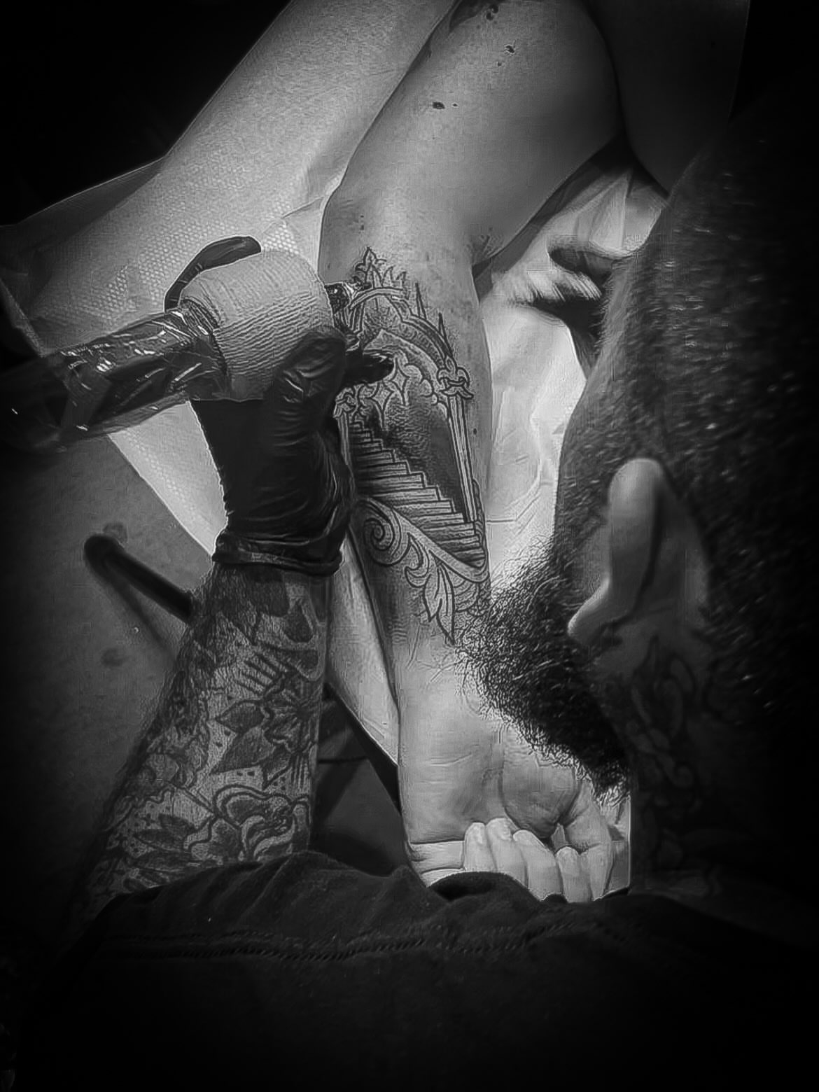 Staircase with ornate details black and grey tattoo on the forearm by Andres Flores
