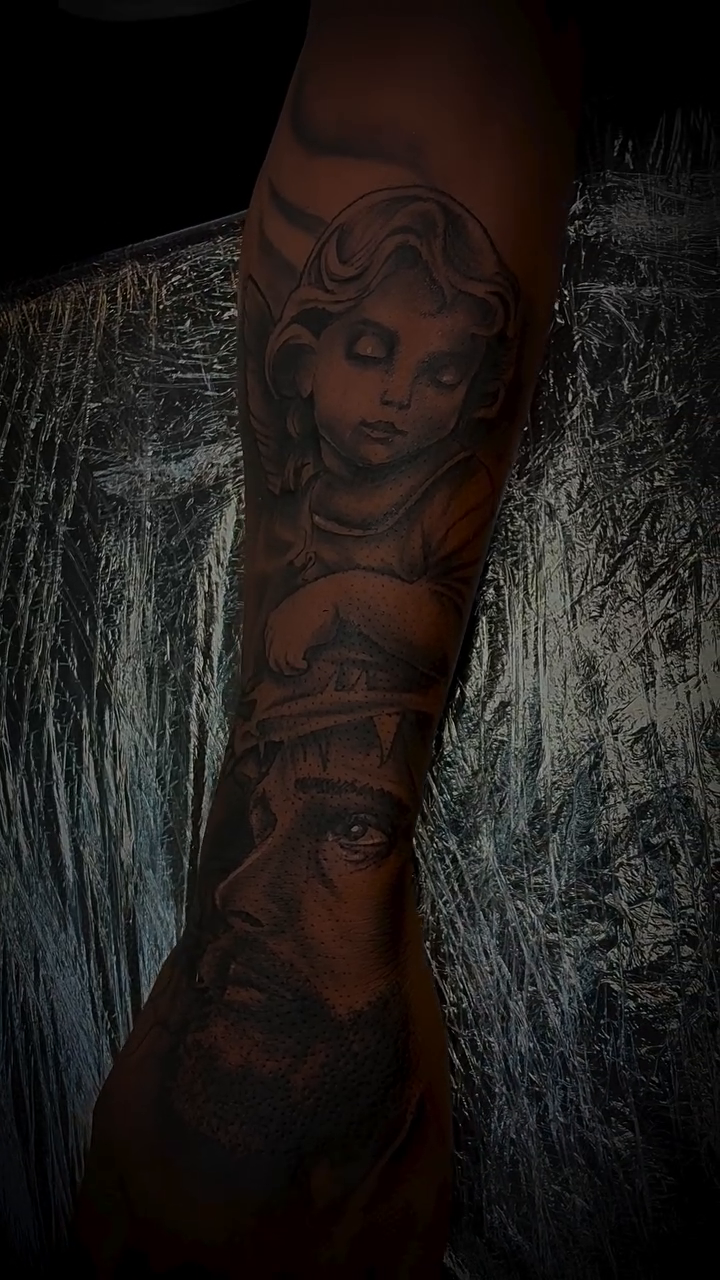 Angel and bearded man realism tattoo by Devin Johnson, Forest Park, Georgia