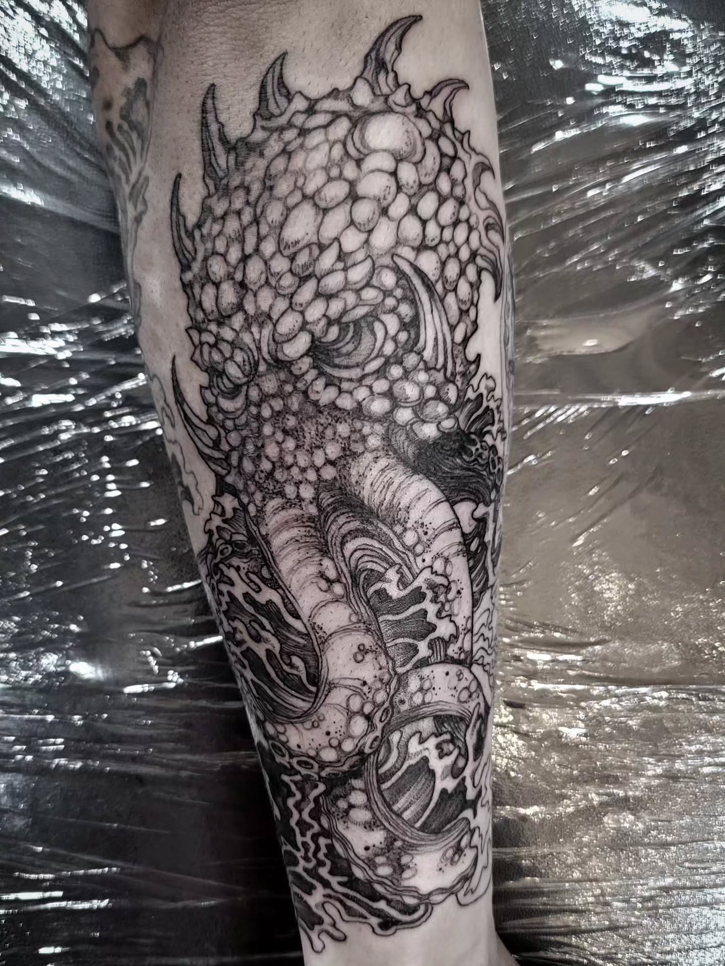 Dragon dotwork tattoo on the forearm by Tricky Lake, Newfield, New Jersey