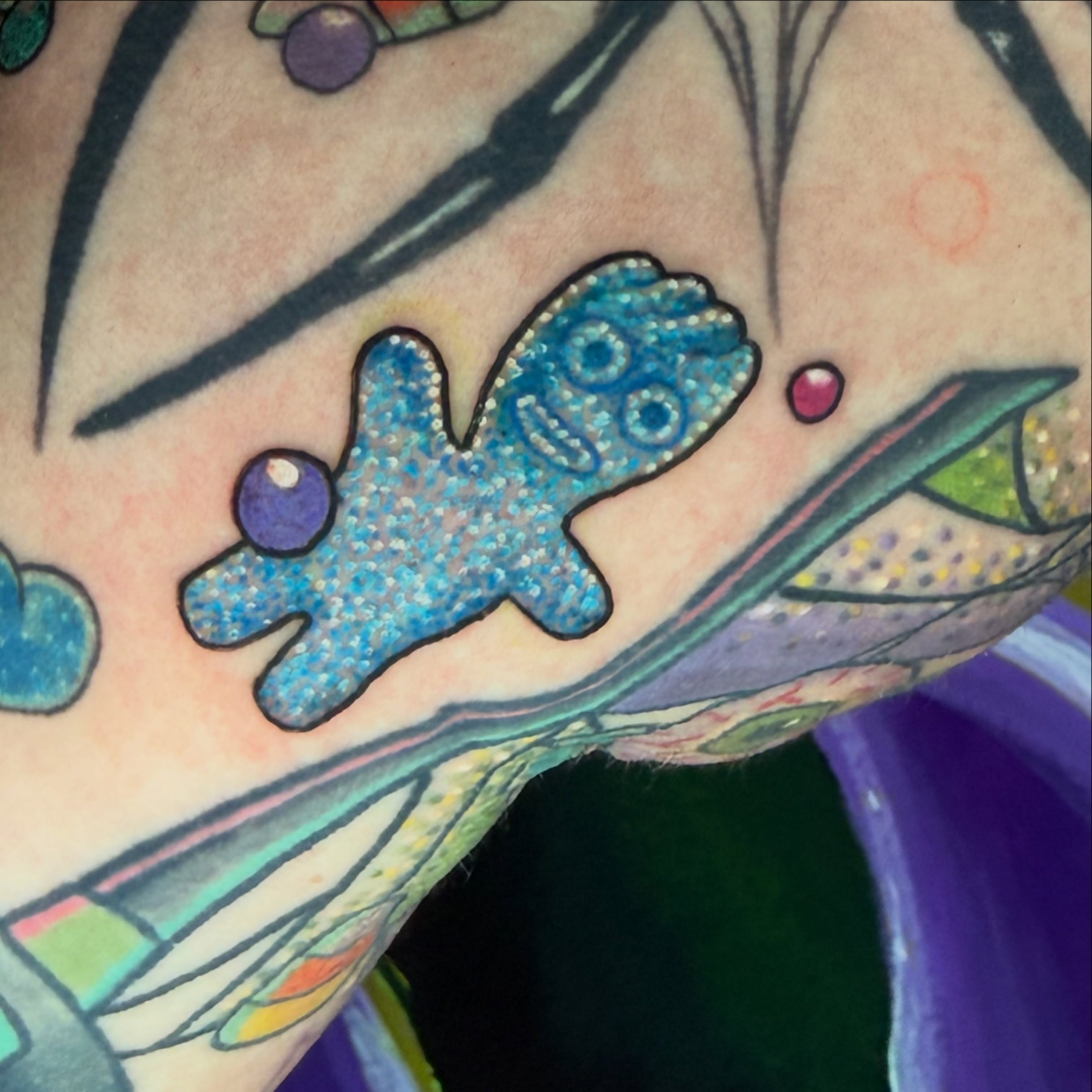 Alien dotwork tattoo on the forearm by Rebecca Preble