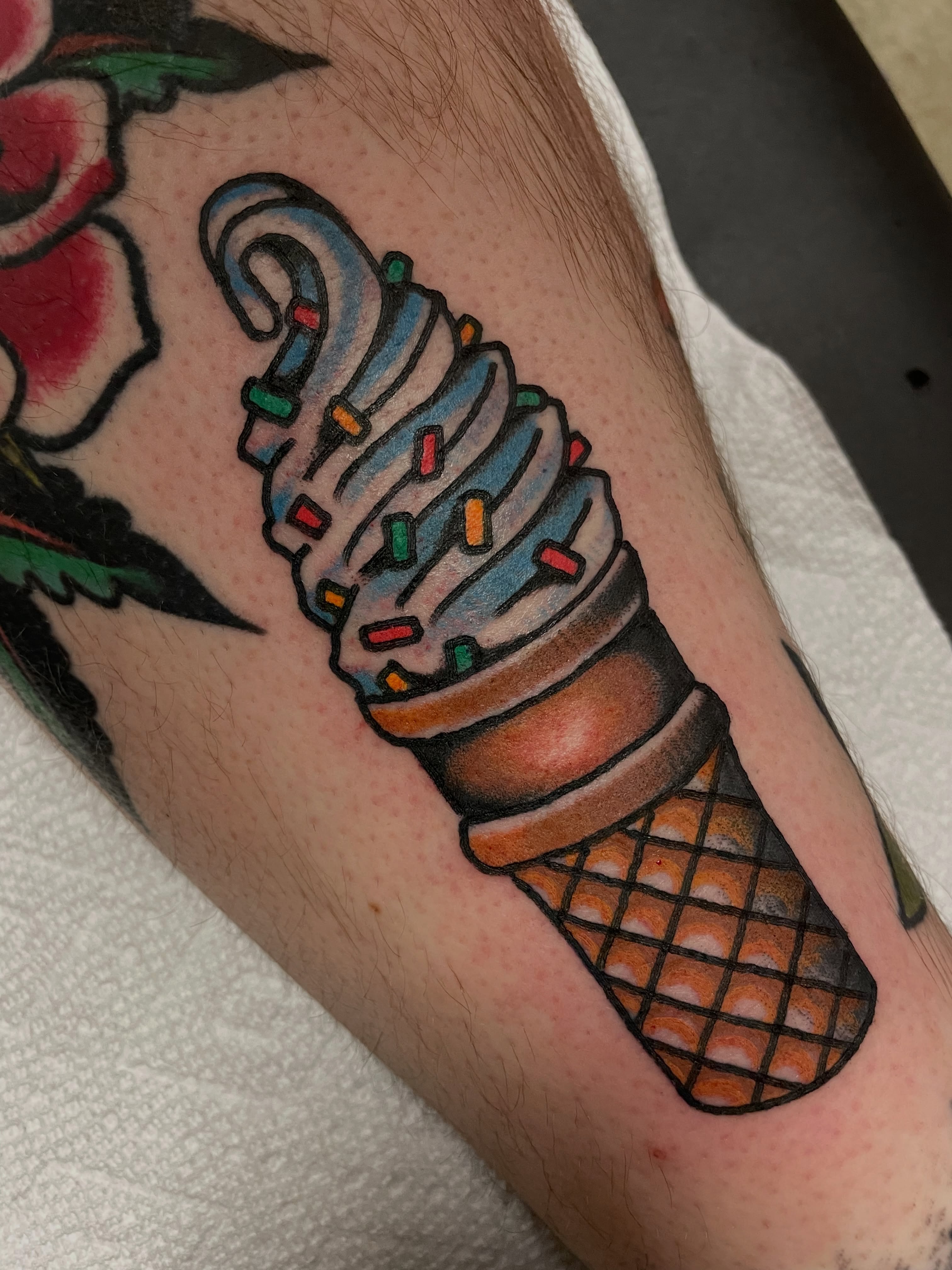 Ice cream cone American traditional tattoo on the forearm by @pizzabref