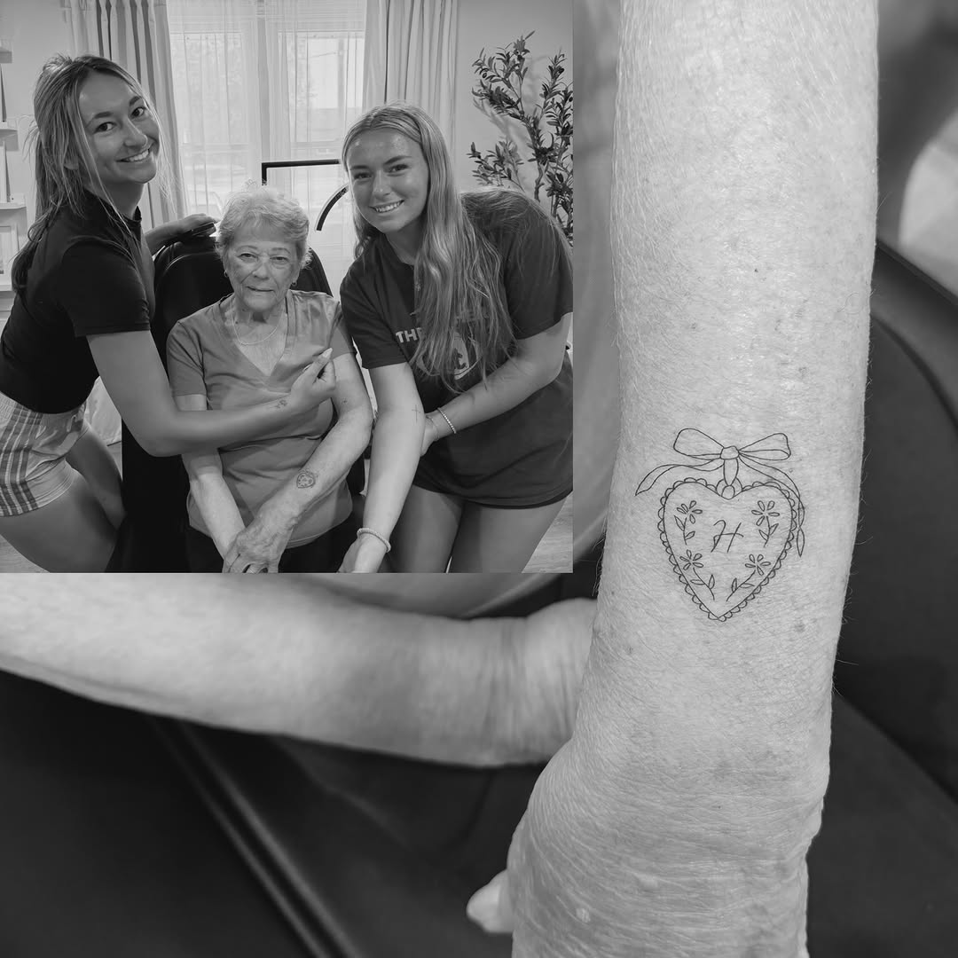 Heart with bow black and grey tattoo on the forearm by Jessica, Cheektowaga, New York