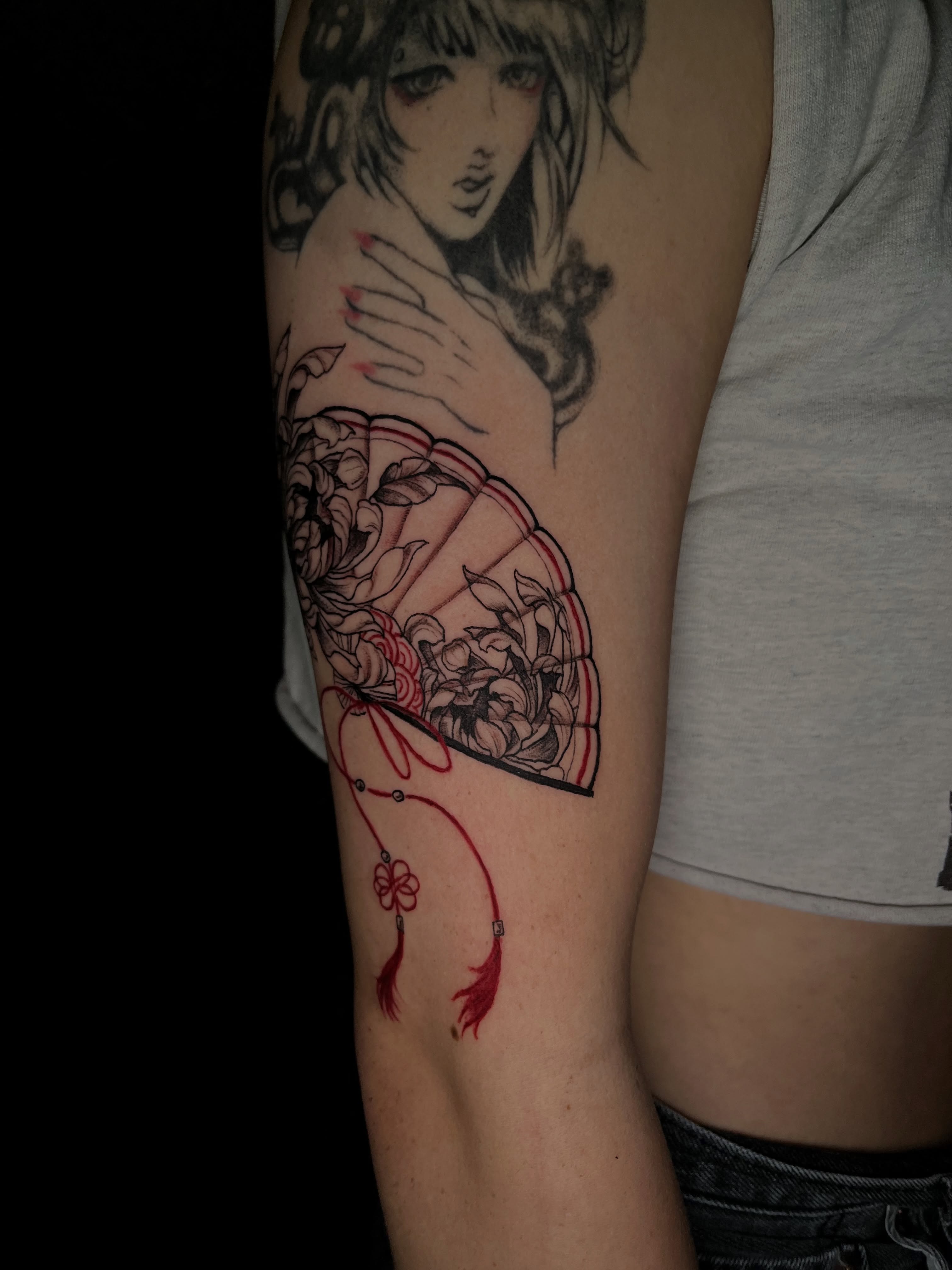 Anime girl with fan anime tattoo on the forearm by bev